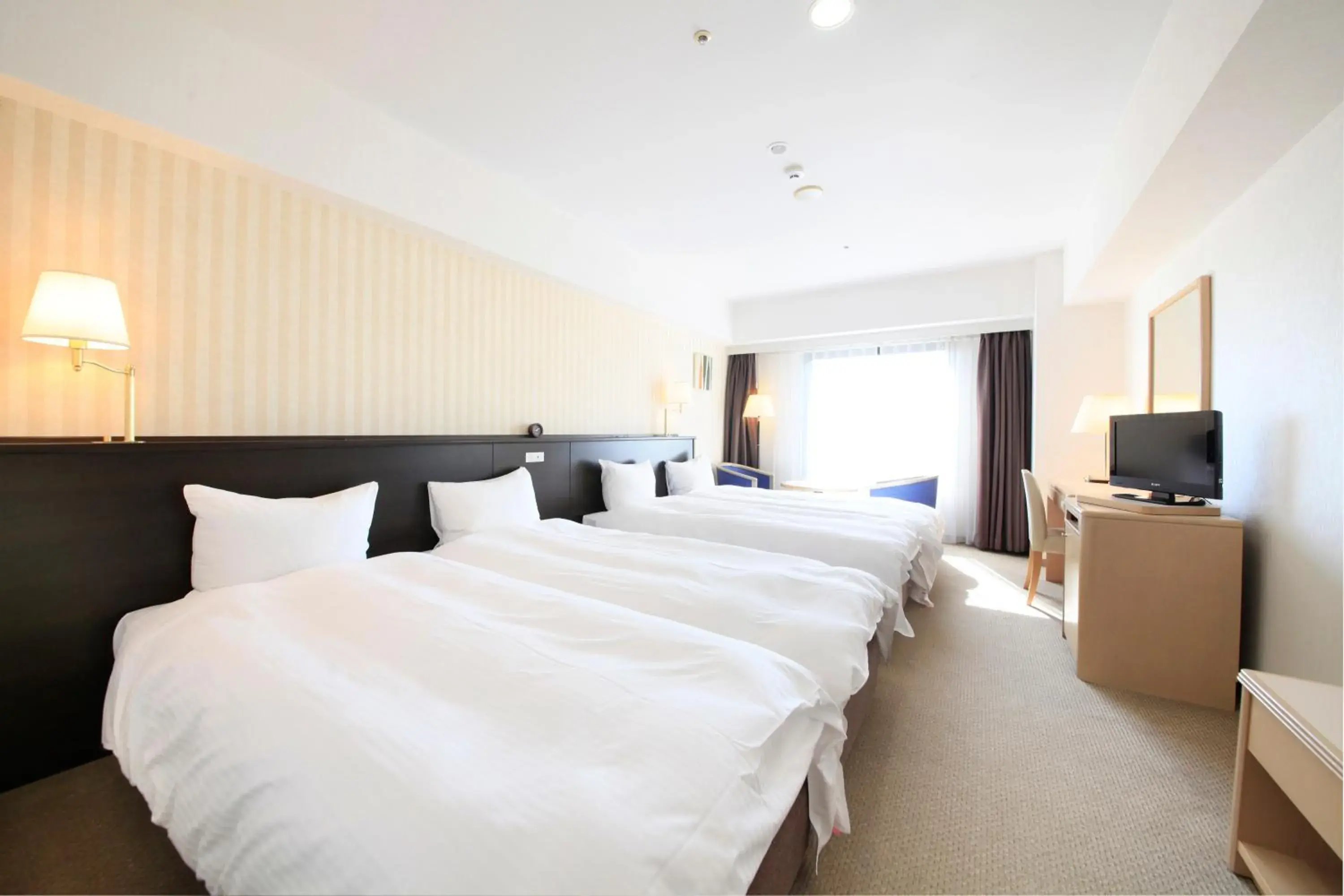 Photo of the whole room, Bed in Quintessa Hotel Sasebo Photo of the whole room, Bed in Quintessa Hotel Sasebo