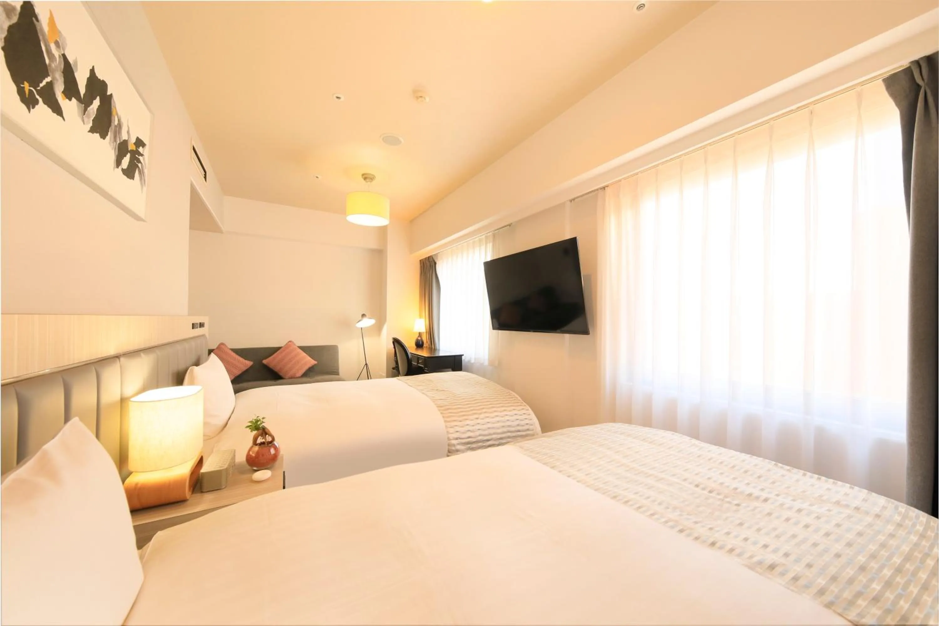 Bed in QuintessaHotel KagoshimaTenmonkan Relax&Sleep