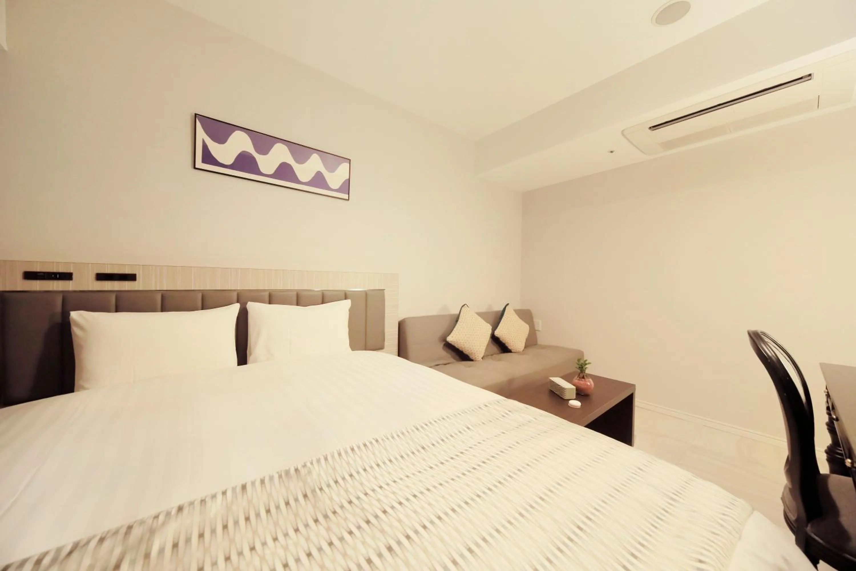 Bed in QuintessaHotel KagoshimaTenmonkan Relax&Sleep