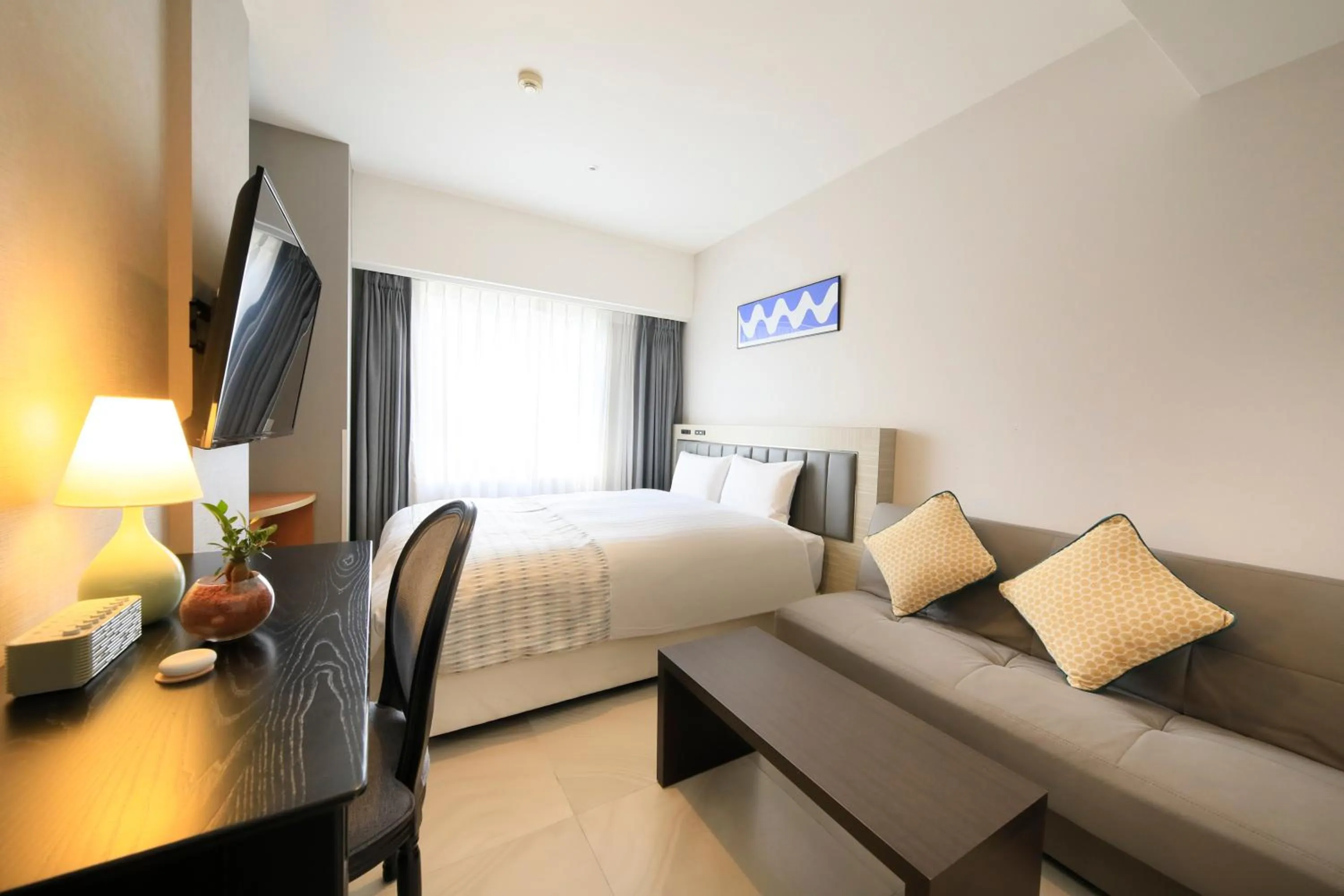 Bed in QuintessaHotel KagoshimaTenmonkan Relax&Sleep