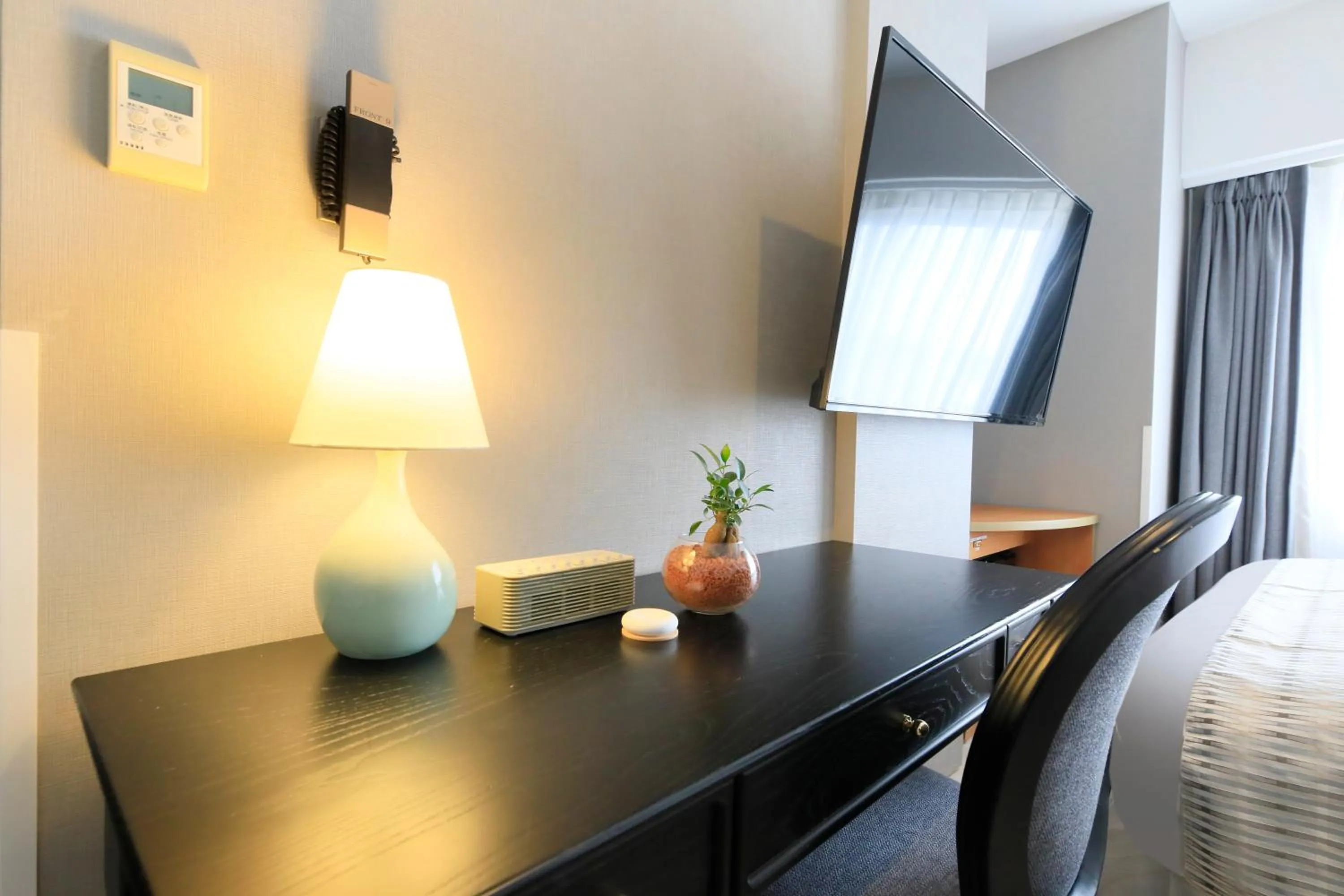 Bed in QuintessaHotel KagoshimaTenmonkan Relax&Sleep