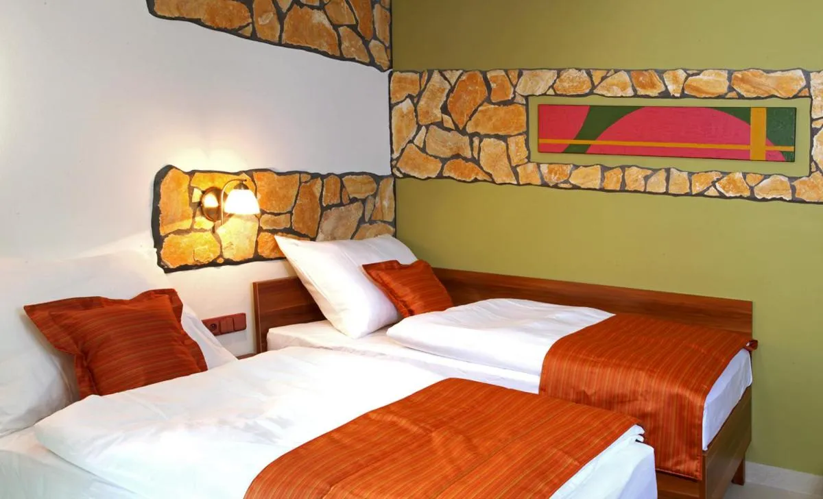 Bed in Hotel Vinopa