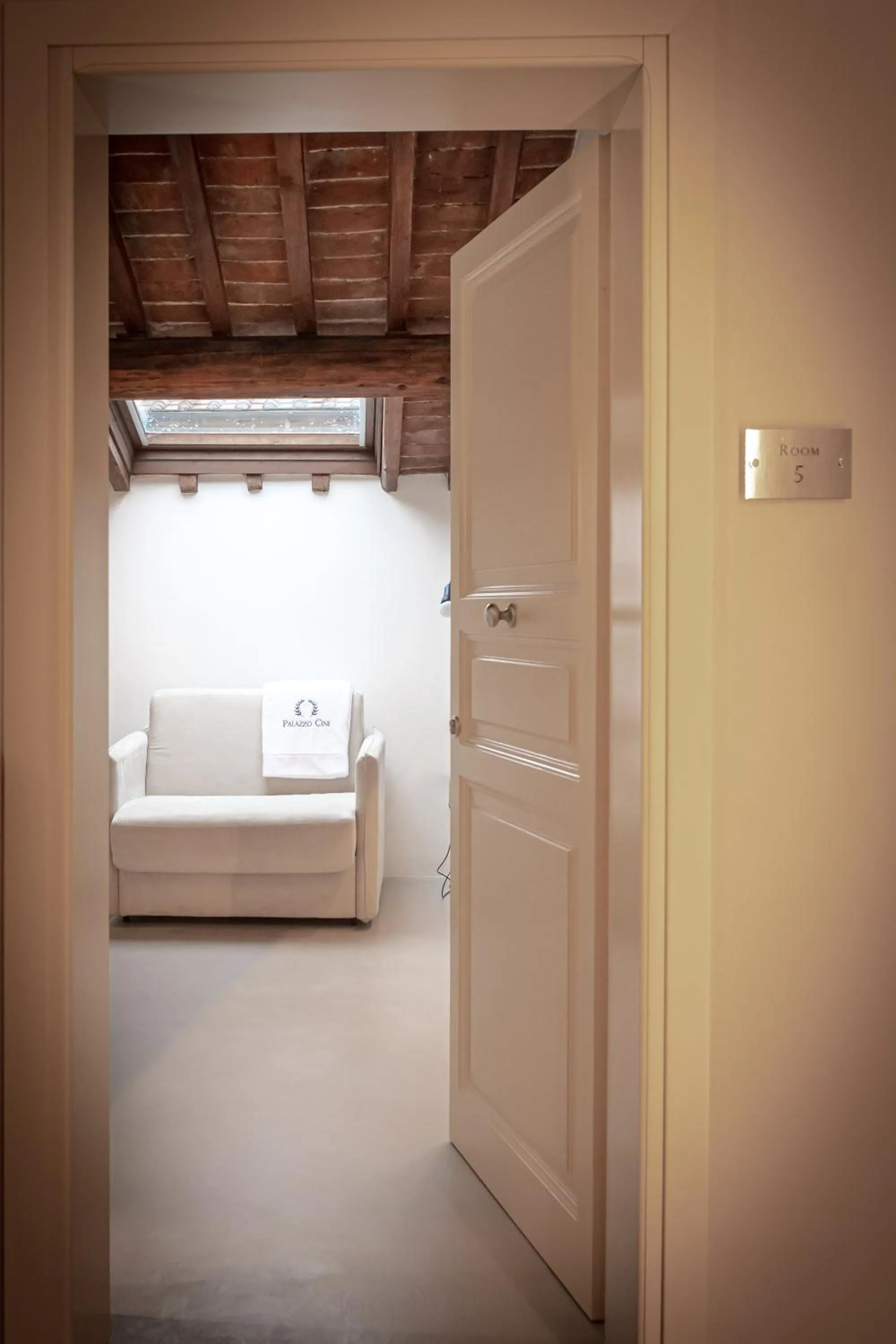 Photo of the whole room, Bed in Palazzo Cini Luxury Rooms in Pisa