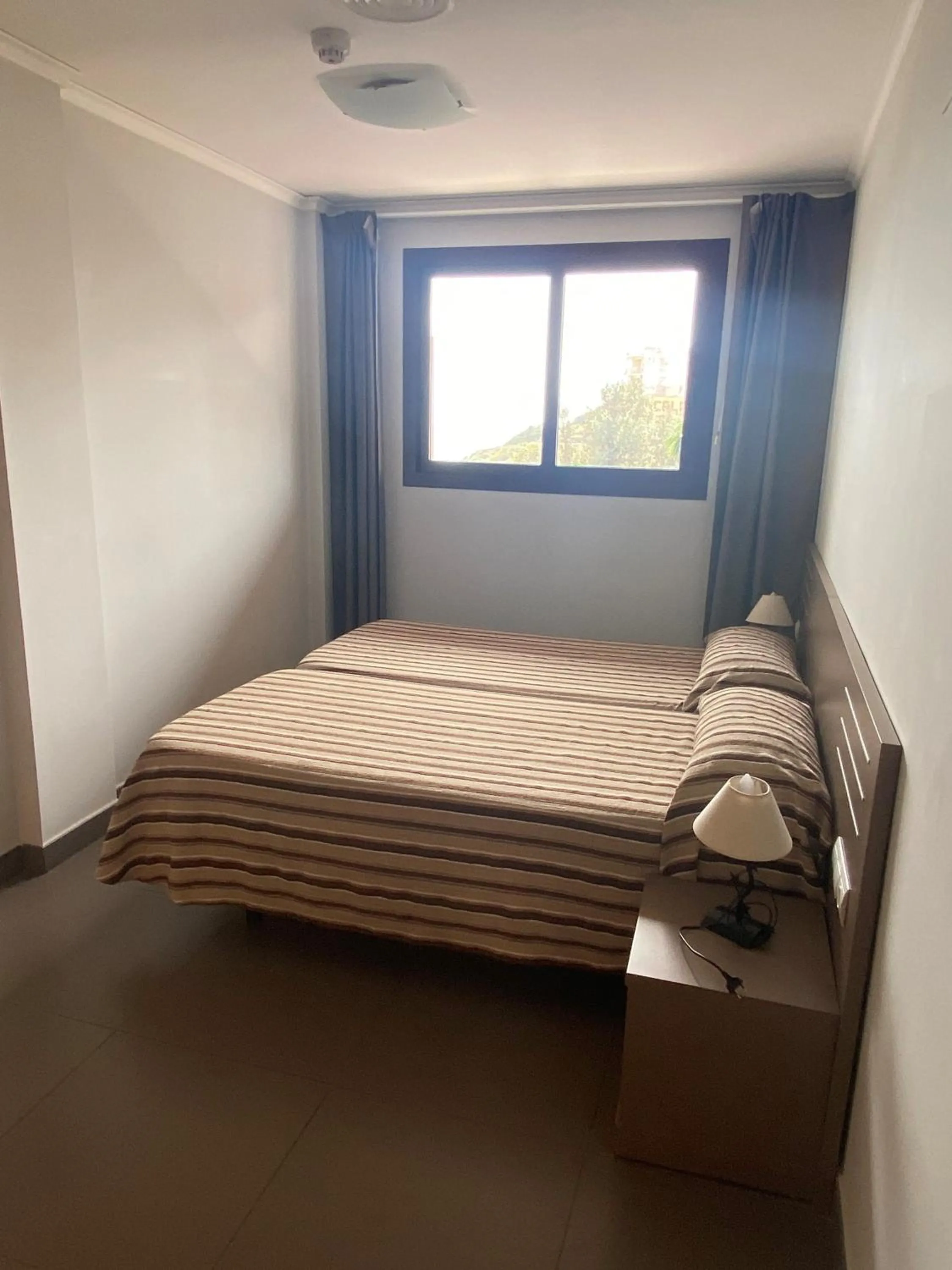 Bed in Aparthotel El Faro