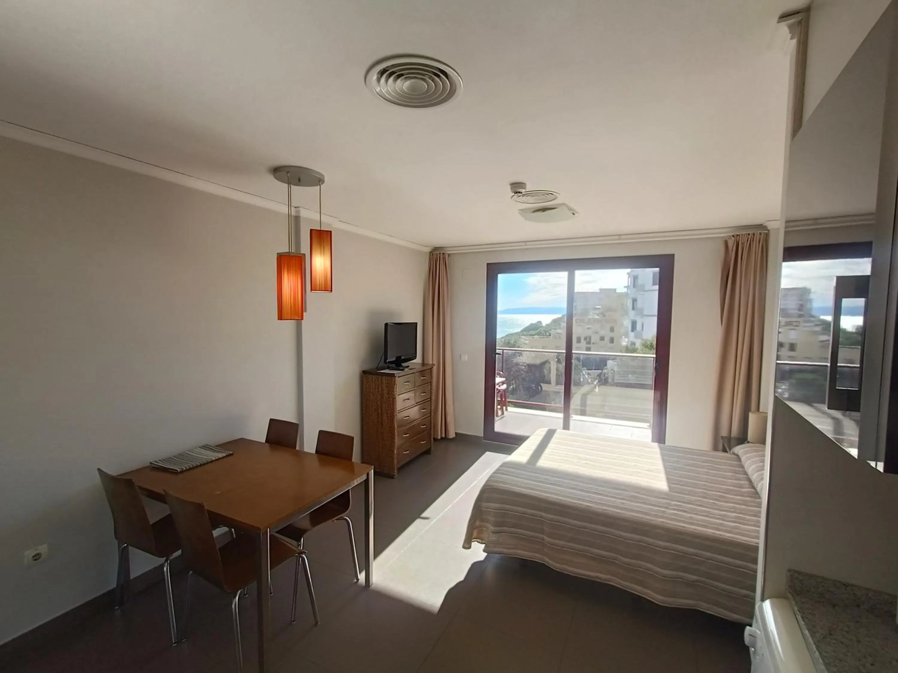 Bed in Aparthotel El Faro