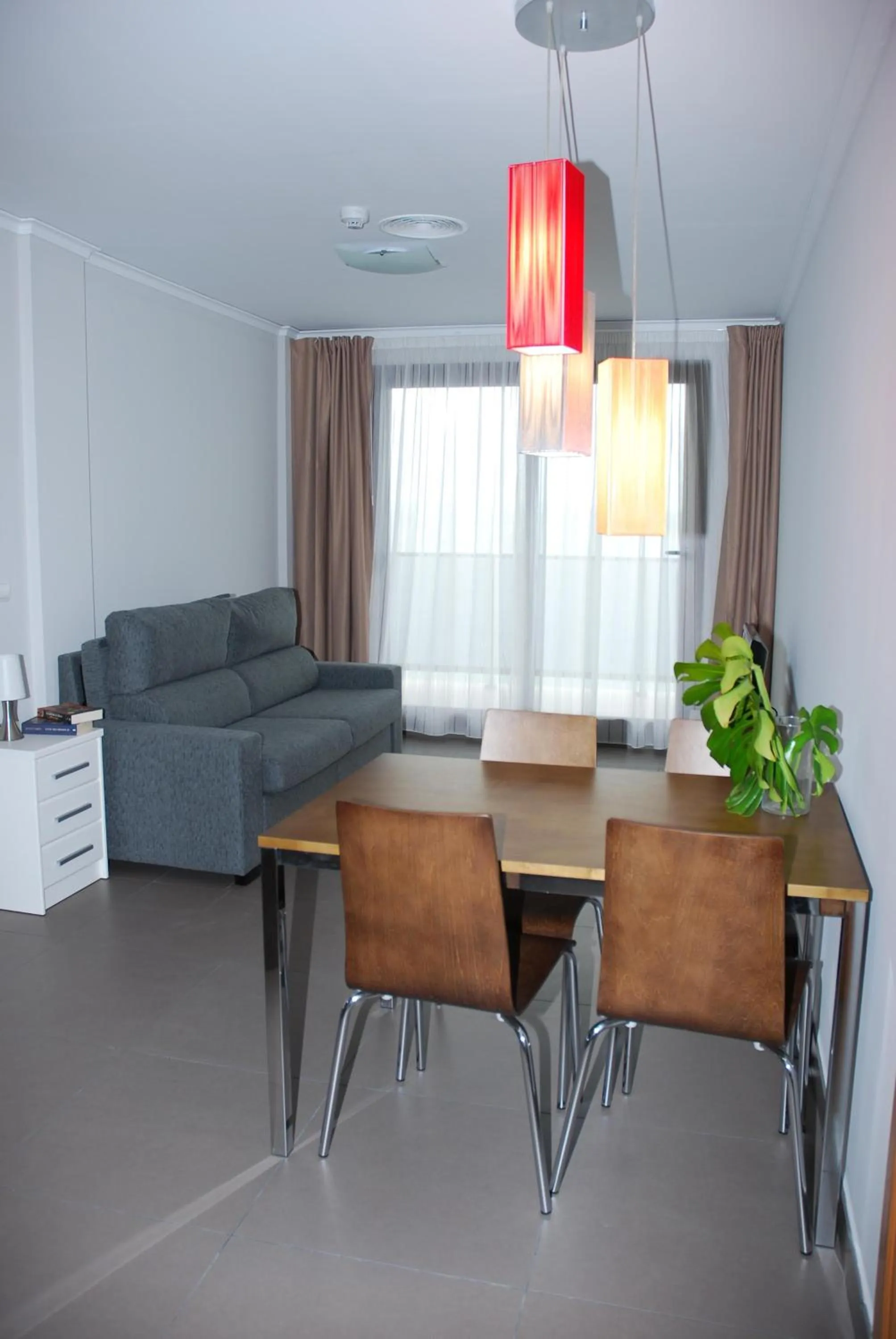 Photo of the whole room in Aparthotel El Faro