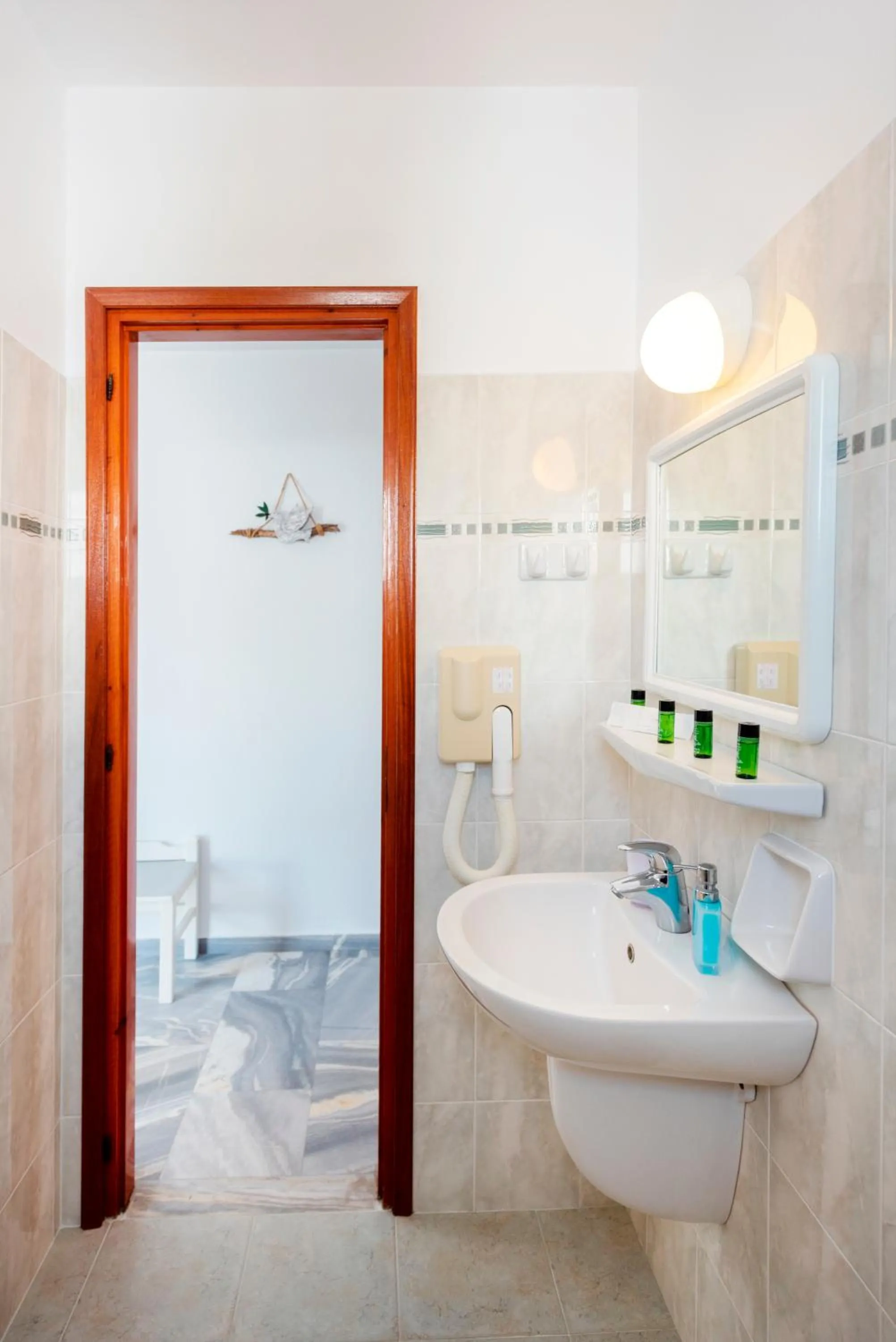 Toilet in Irene Hotel - Beachfront