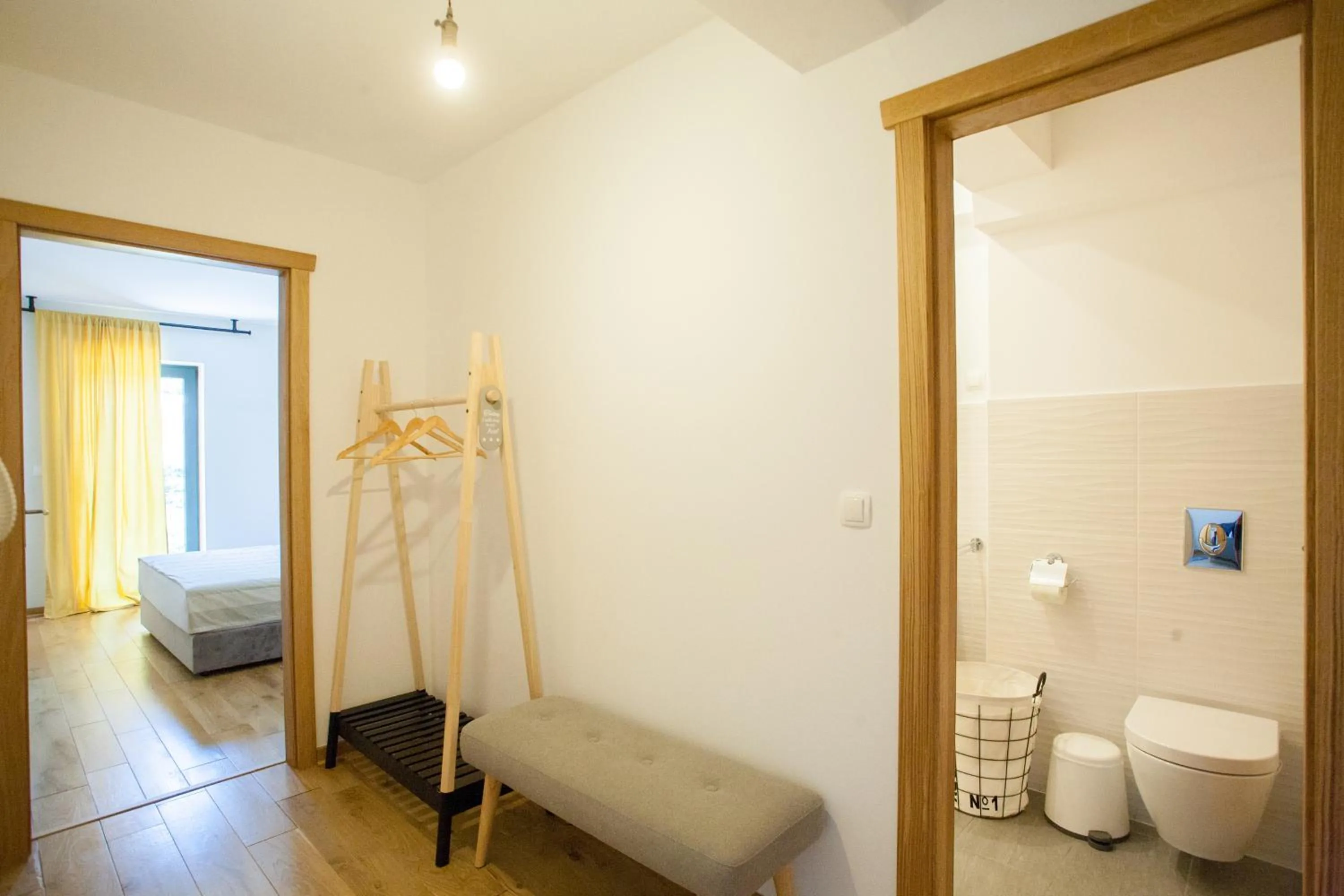 Toilet, Bed in Bella Vista Suites