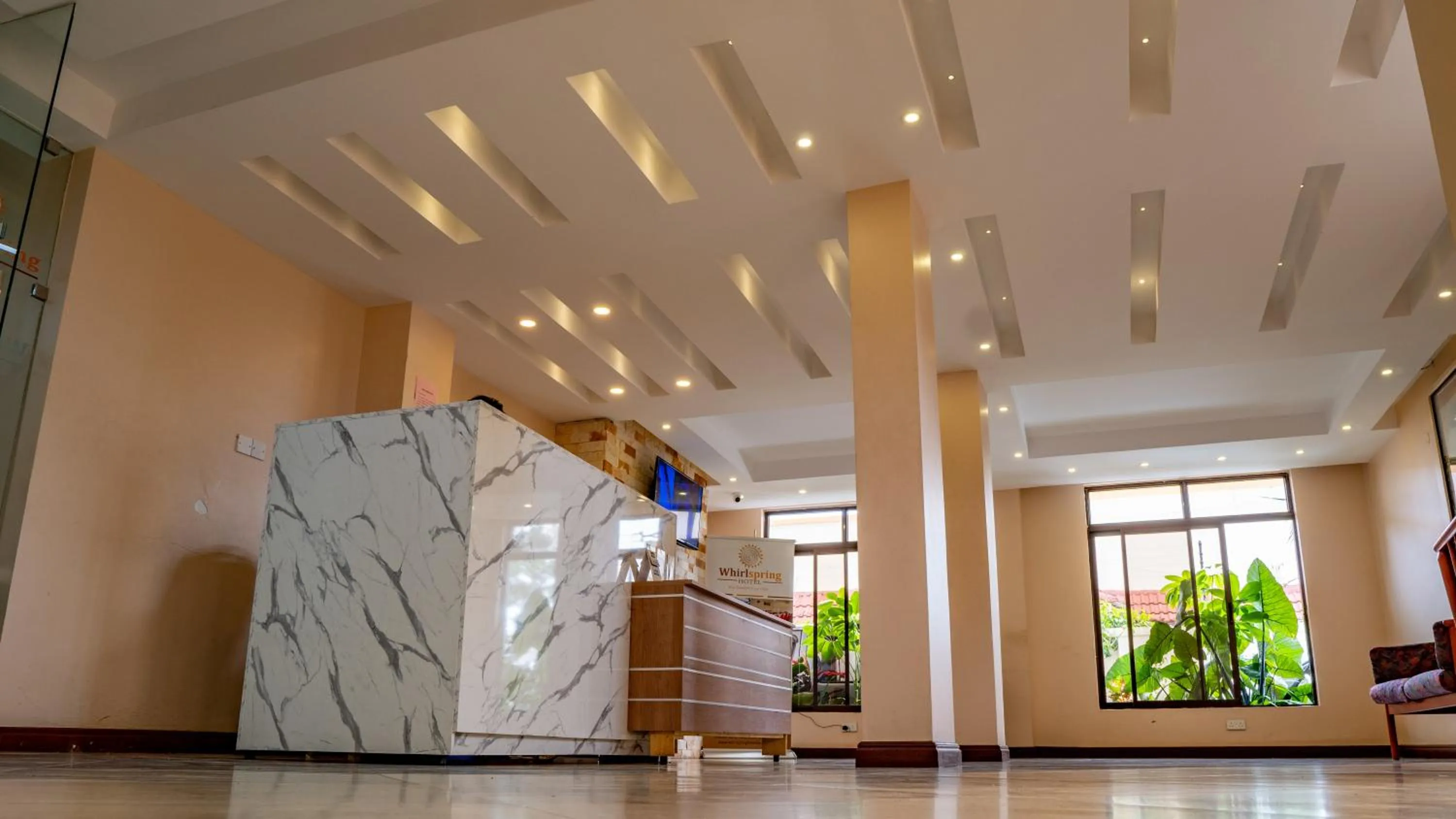 Lobby or reception in Whirlspring Hotel