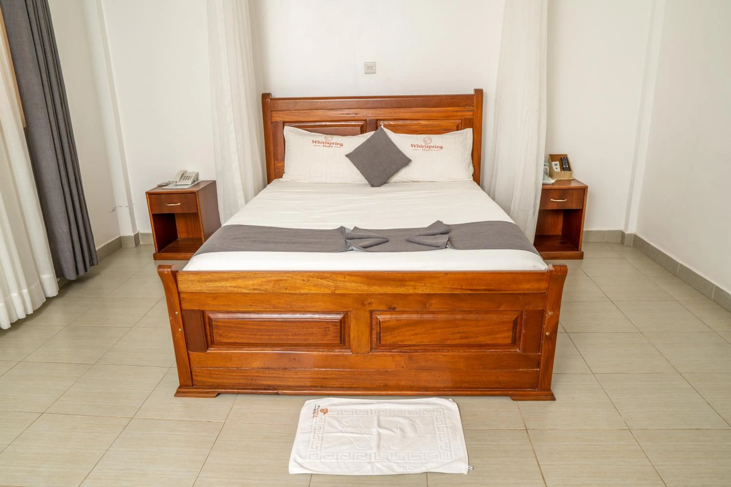 Bed in Whirlspring Hotel