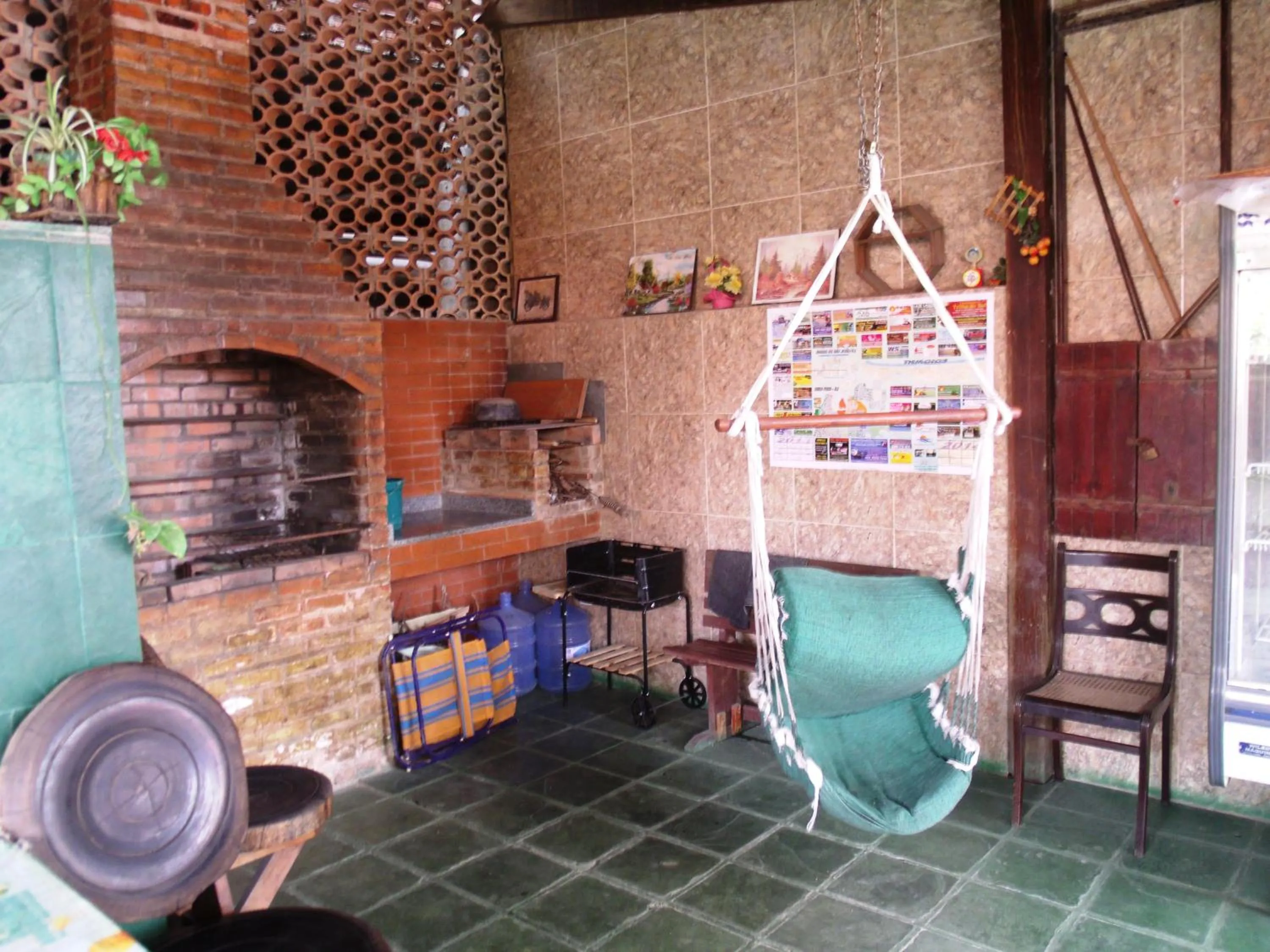 Communal lounge/ TV room in Suítes Brisa Mar