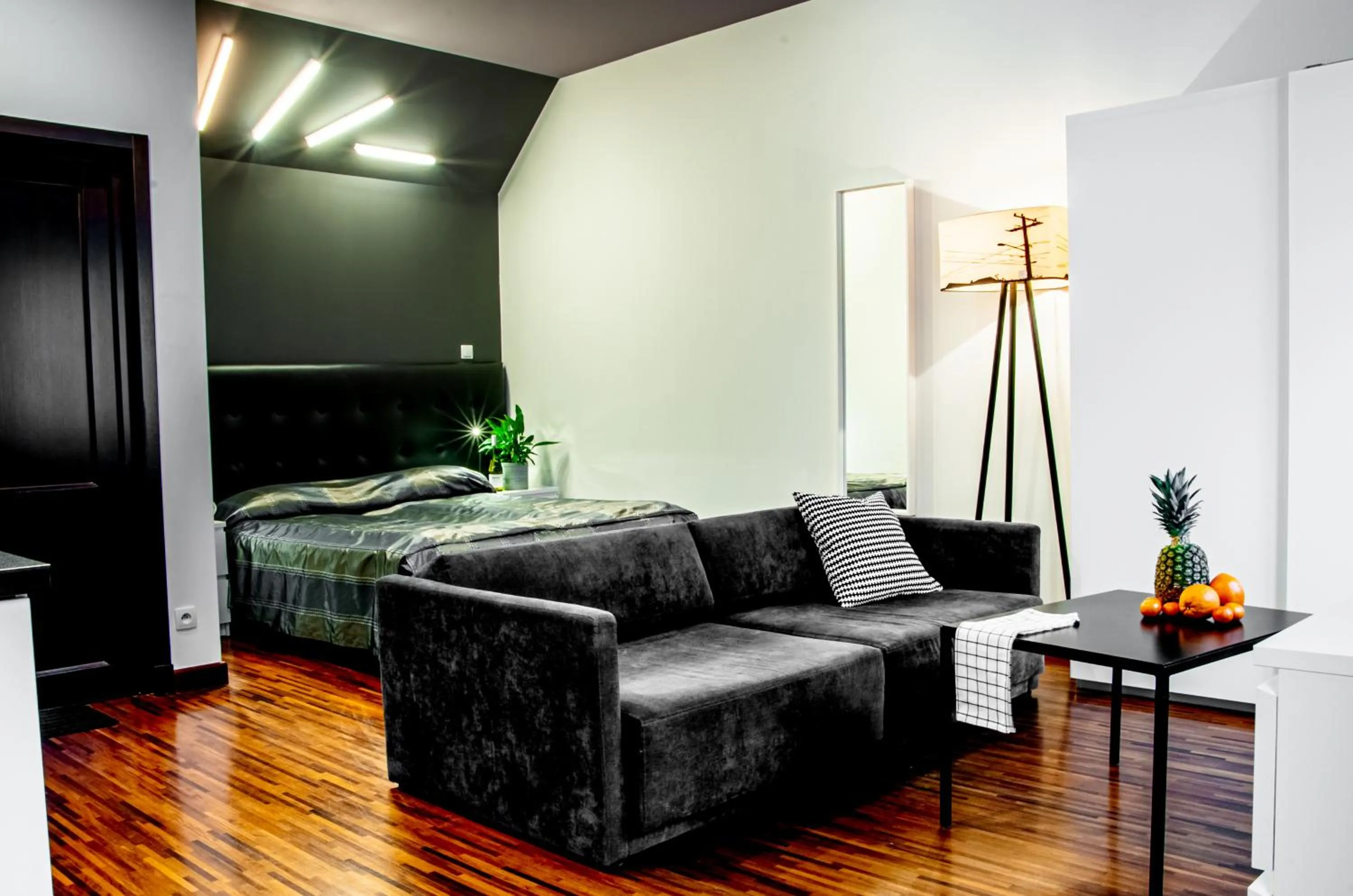 Seating area, Bed in Home & Travel Apartments - AC - Parking - City Centre - Manufaktura - OFF Piotrkowska - EC1 - ATLAS Arena - Orientarium - Monopolis