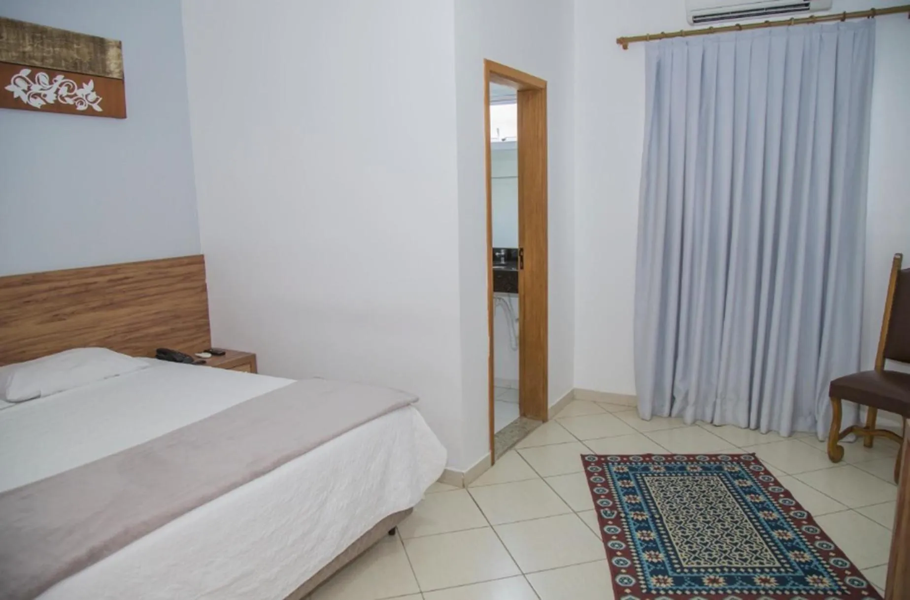 Bed in Hotel Casablanca Suites