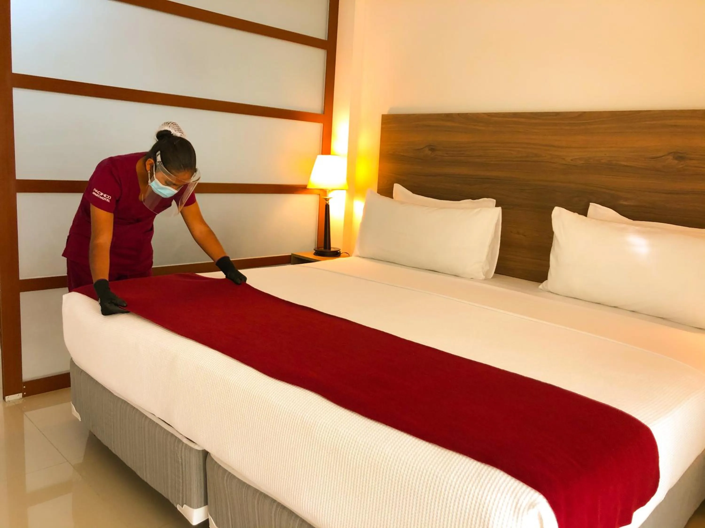 Bed in Pacifico Apart Hotel