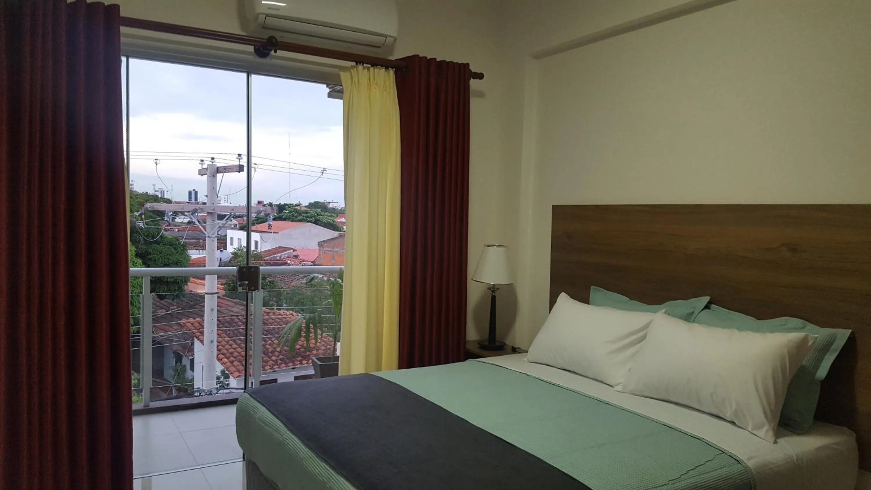 Property building, Bed in Pacifico Apart Hotel