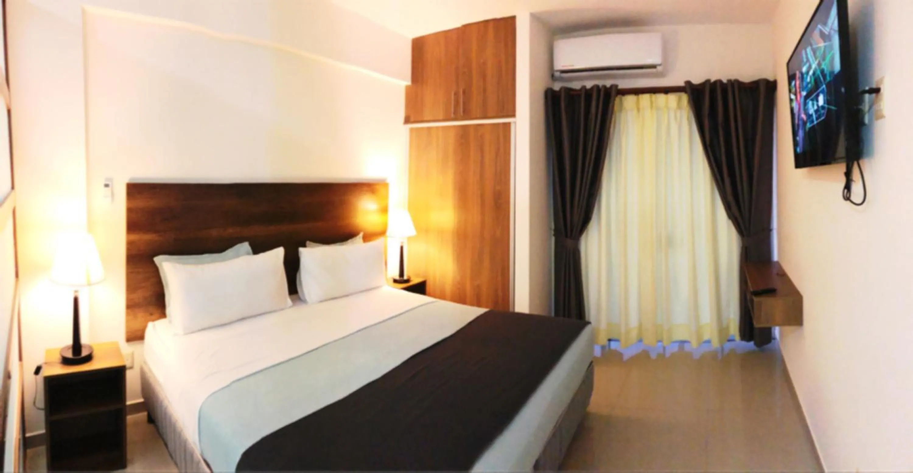 Bed in Pacifico Apart Hotel