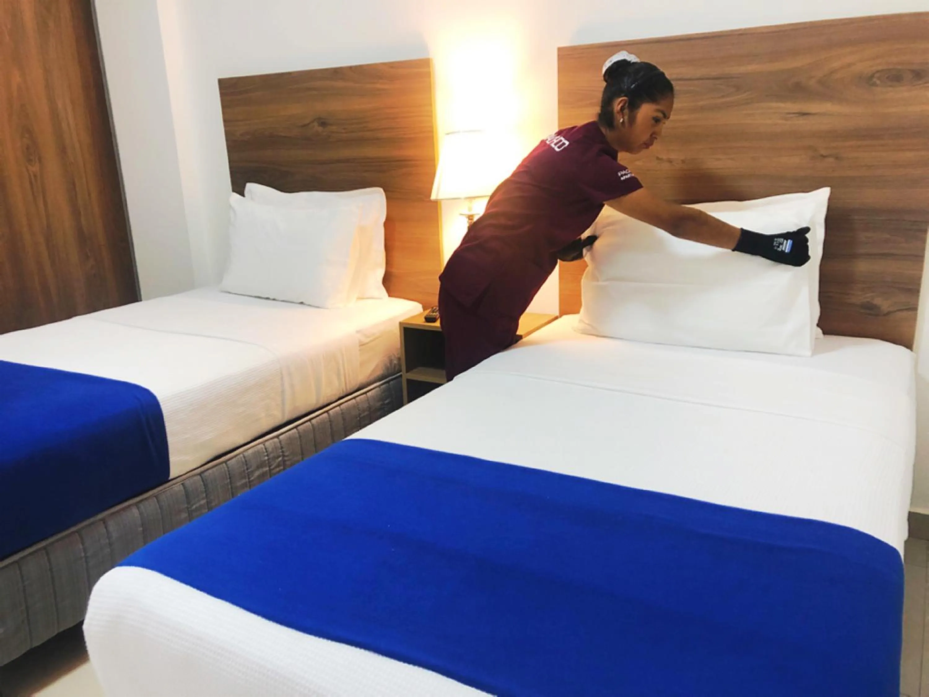 Bed in Pacifico Apart Hotel