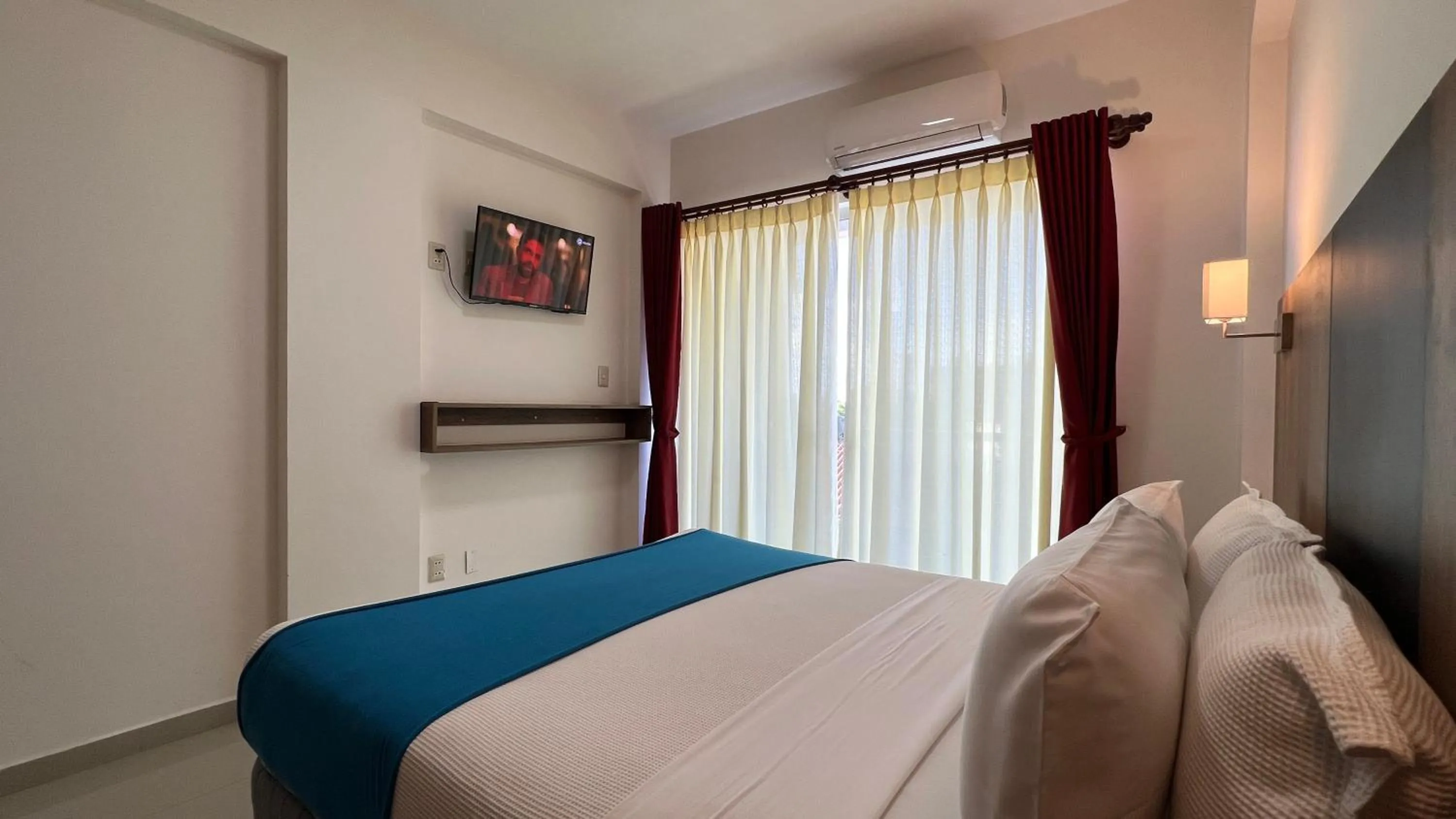 Bed in Pacifico Apart Hotel