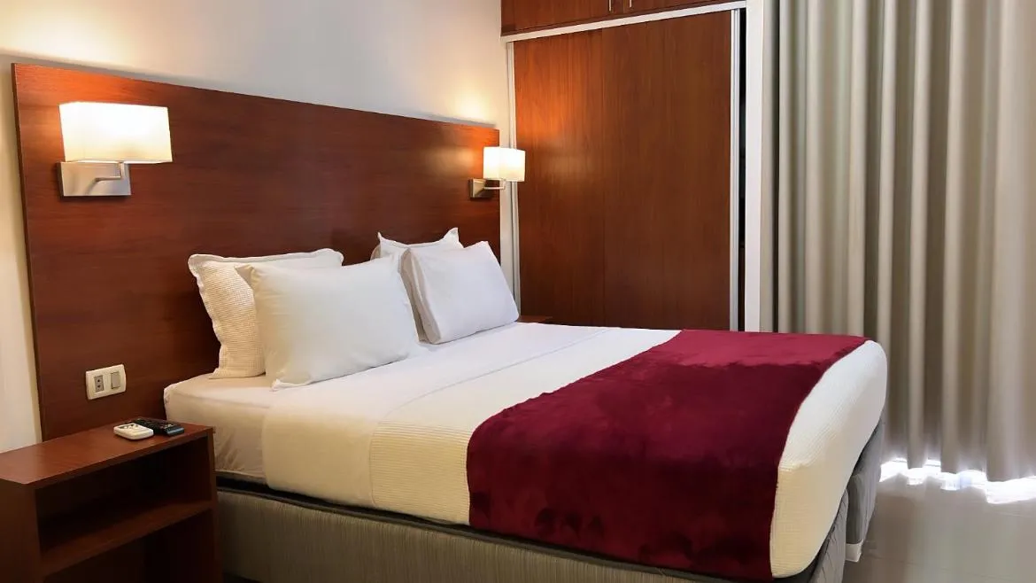 Bed in Pacifico Apart Hotel