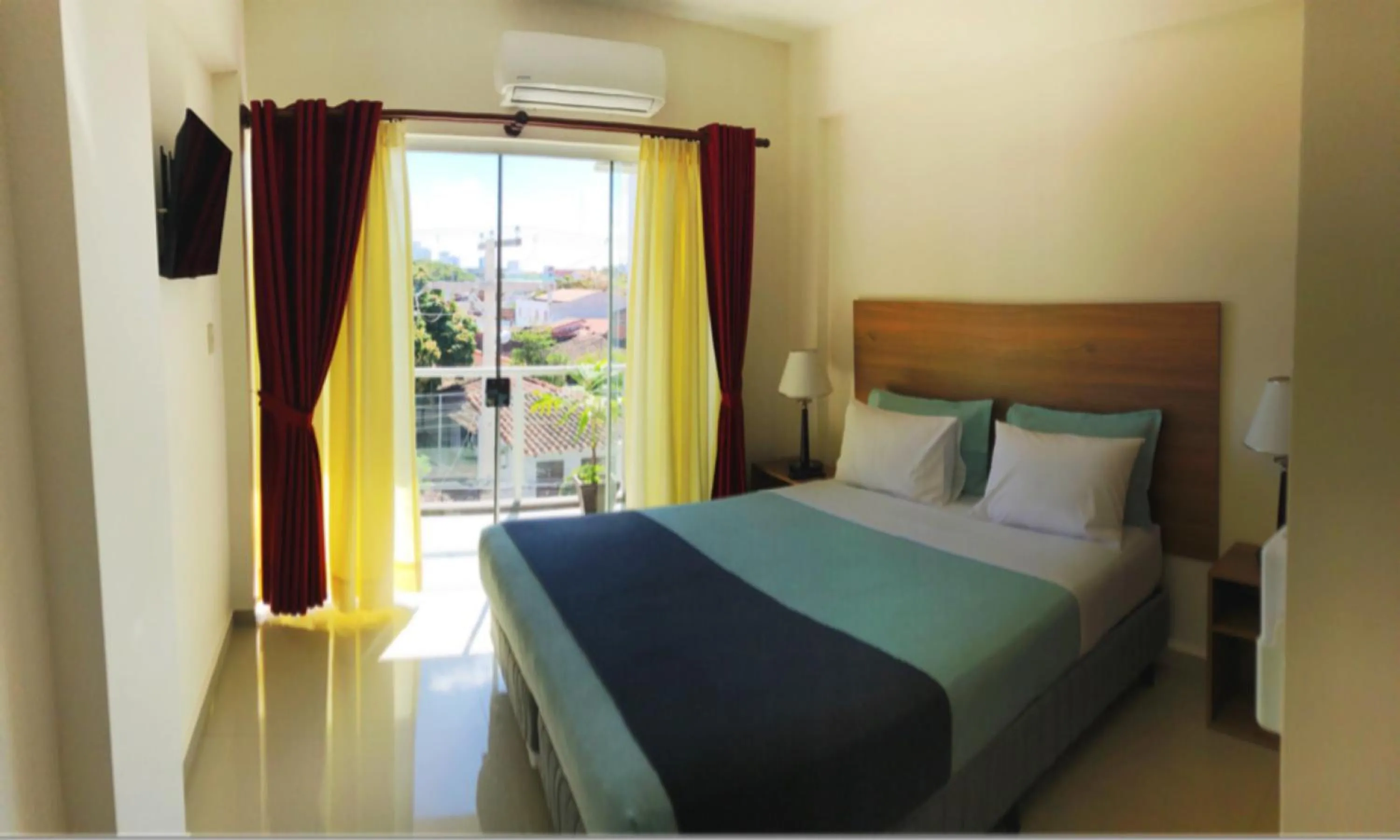 Bed in Pacifico Apart Hotel