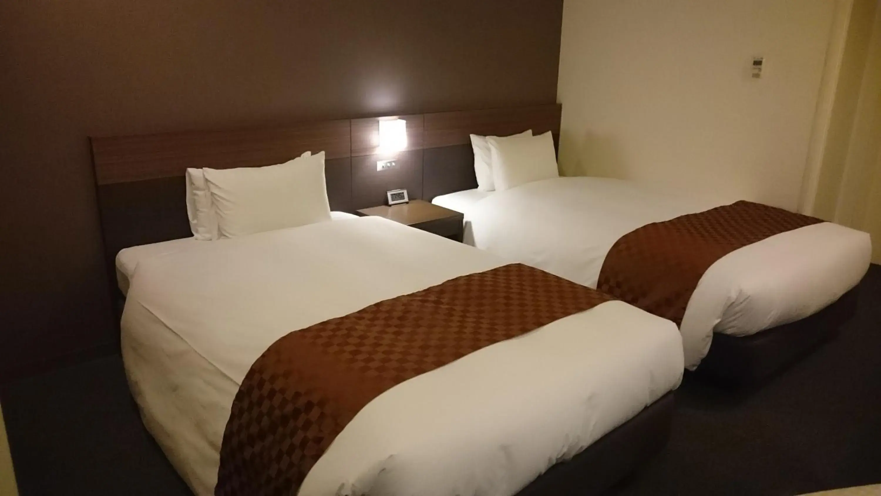 Bed in Hotel Ascent Plaza Hamamatsu Bed in Hotel Ascent Plaza Hamamatsu