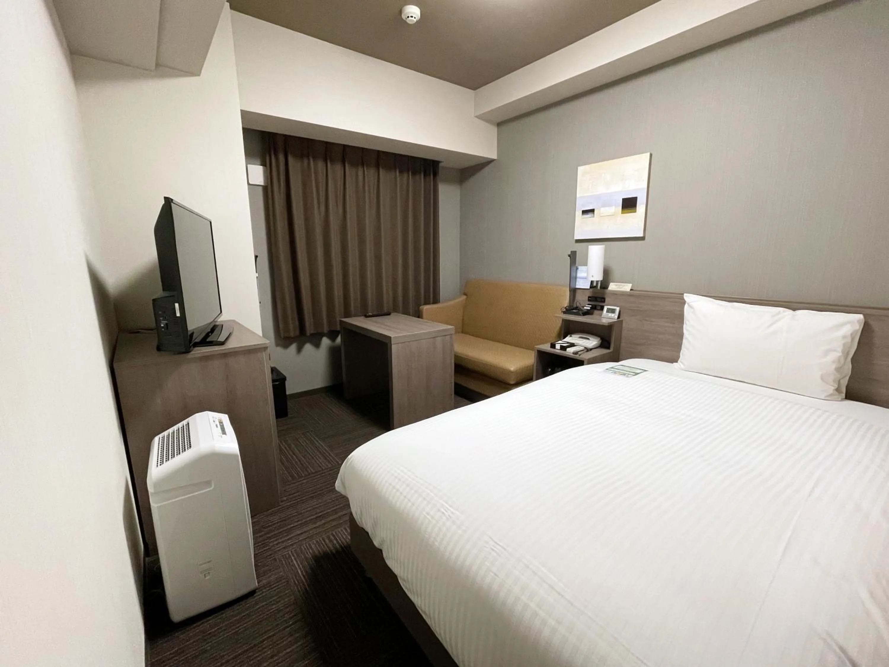 Photo of the whole room, Bed in HOTEL ROUTE-INN Osaka Takaishi -Hagoromo Ekimae-
