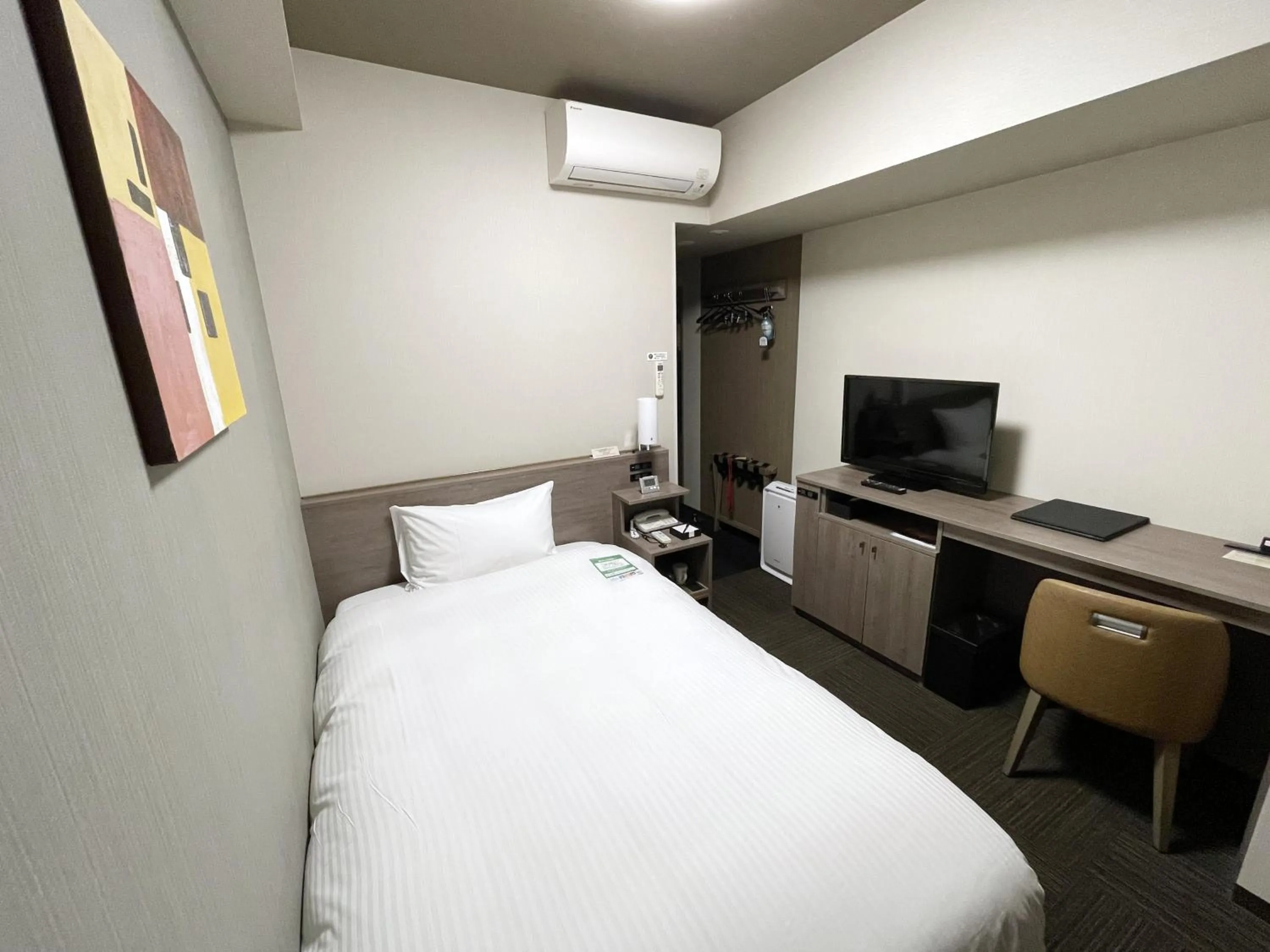 Photo of the whole room, Bed in HOTEL ROUTE-INN Osaka Takaishi -Hagoromo Ekimae-