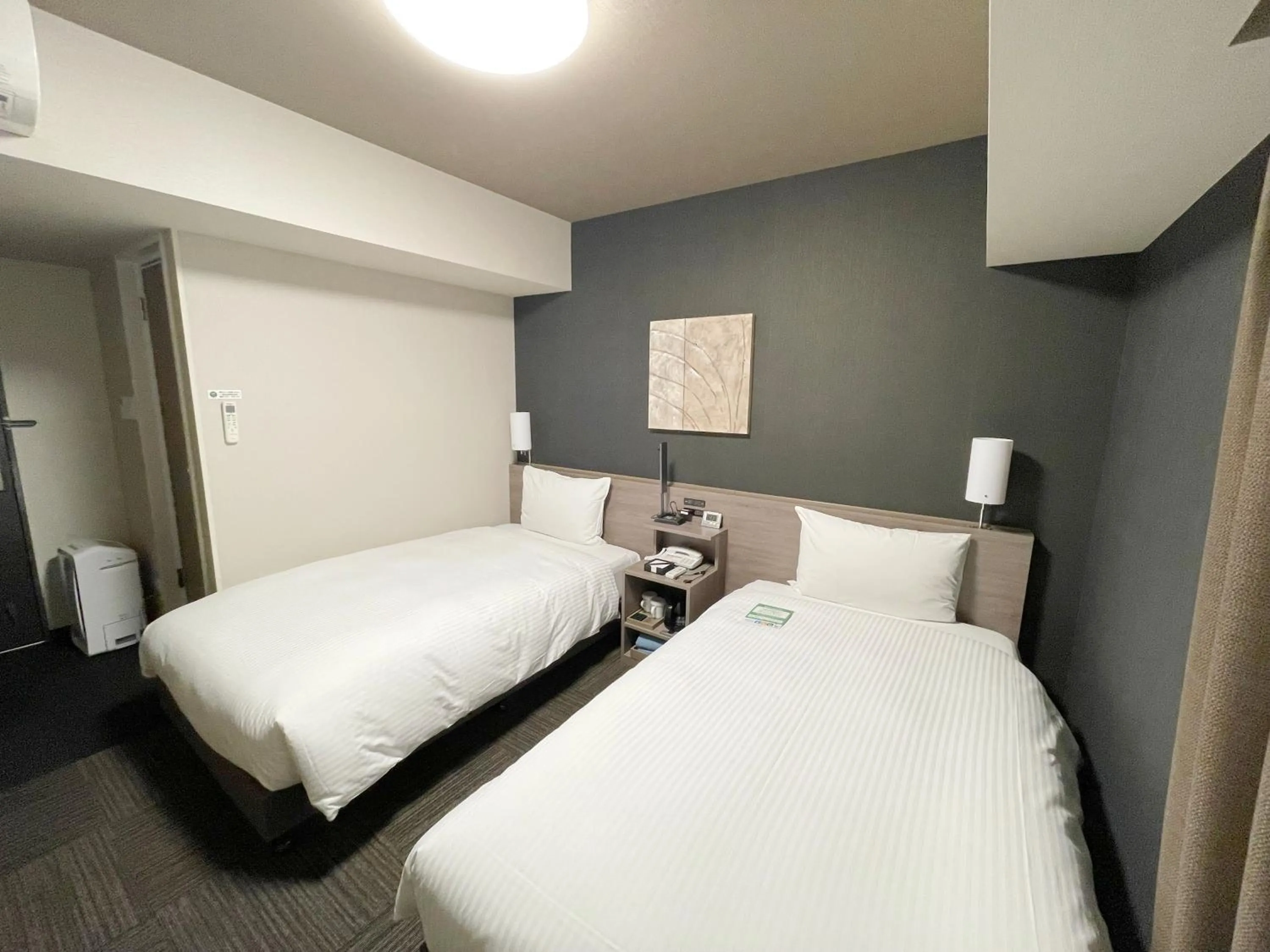 Photo of the whole room, Bed in HOTEL ROUTE-INN Osaka Takaishi -Hagoromo Ekimae-