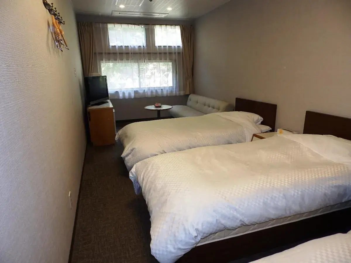 Property building, Bed in Itoen Hotel Toi Property building, Bed in Itoen Hotel Toi