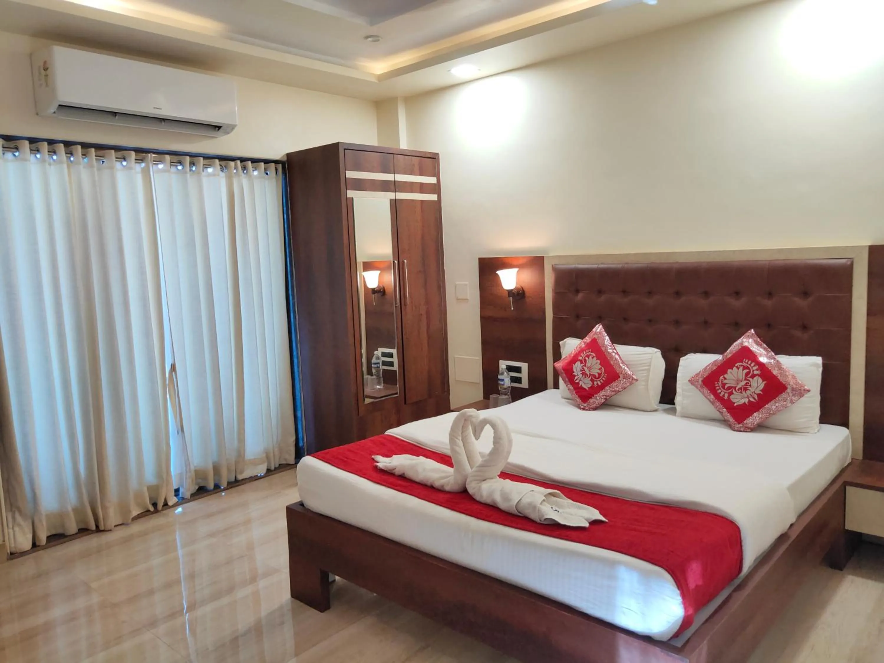 Bed in Hotel Grand Ganesha