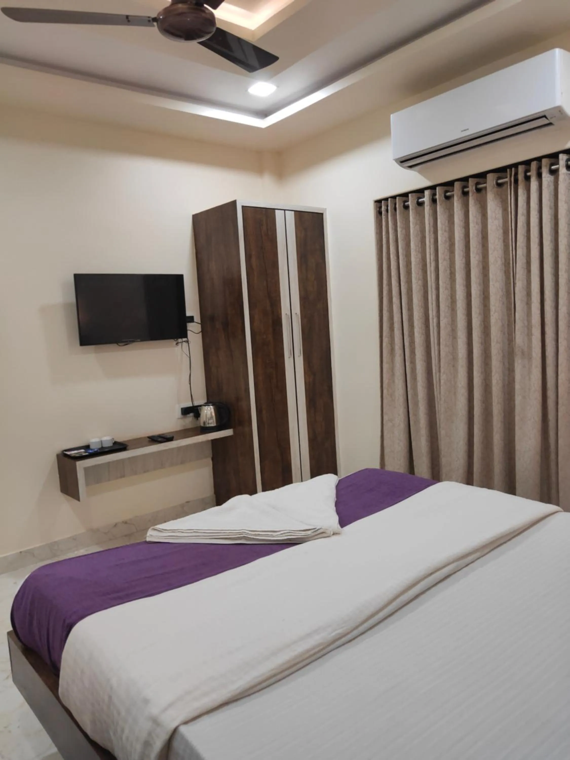 Bed in Hotel Grand Ganesha