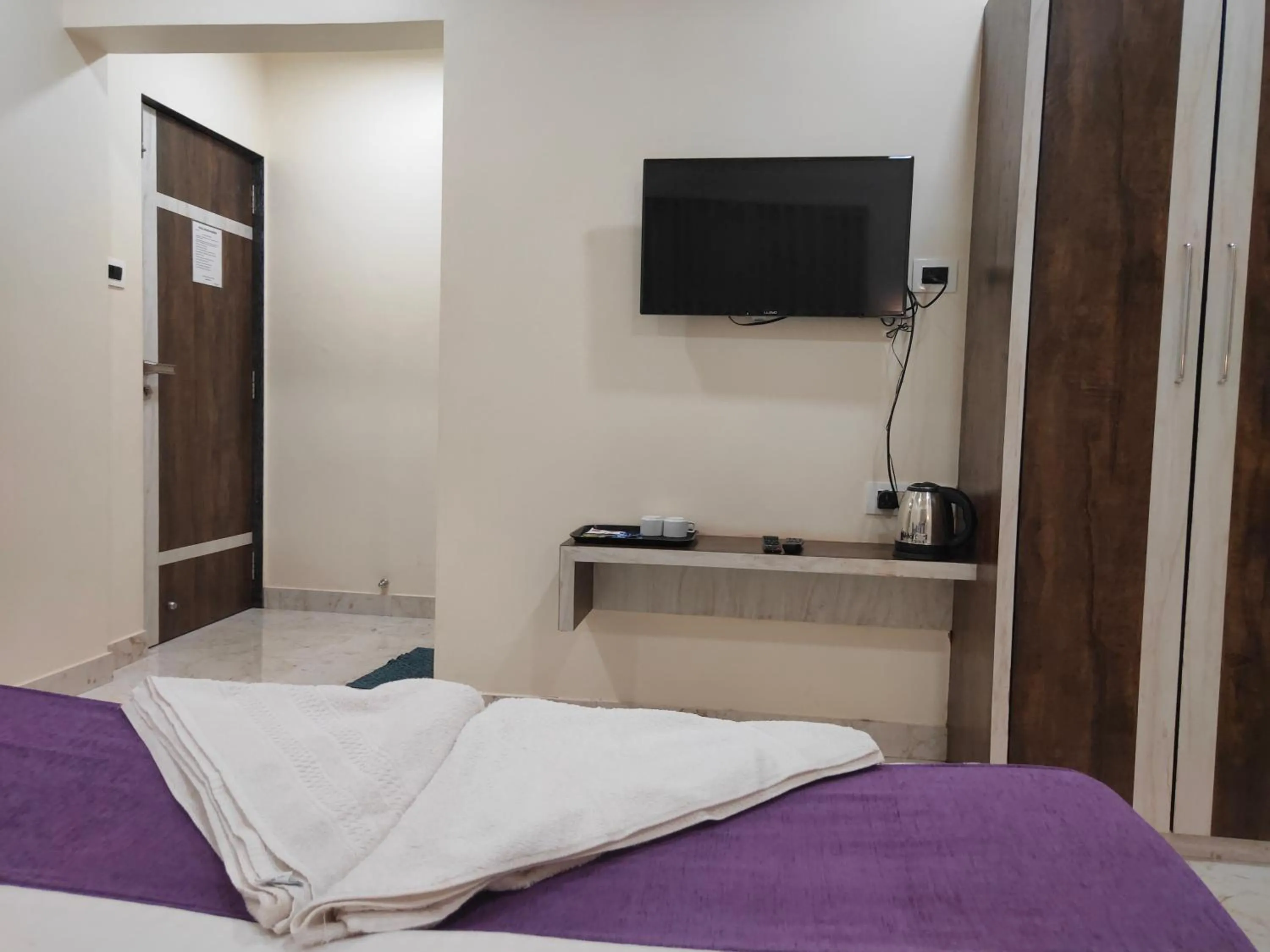 Bed in Hotel Grand Ganesha