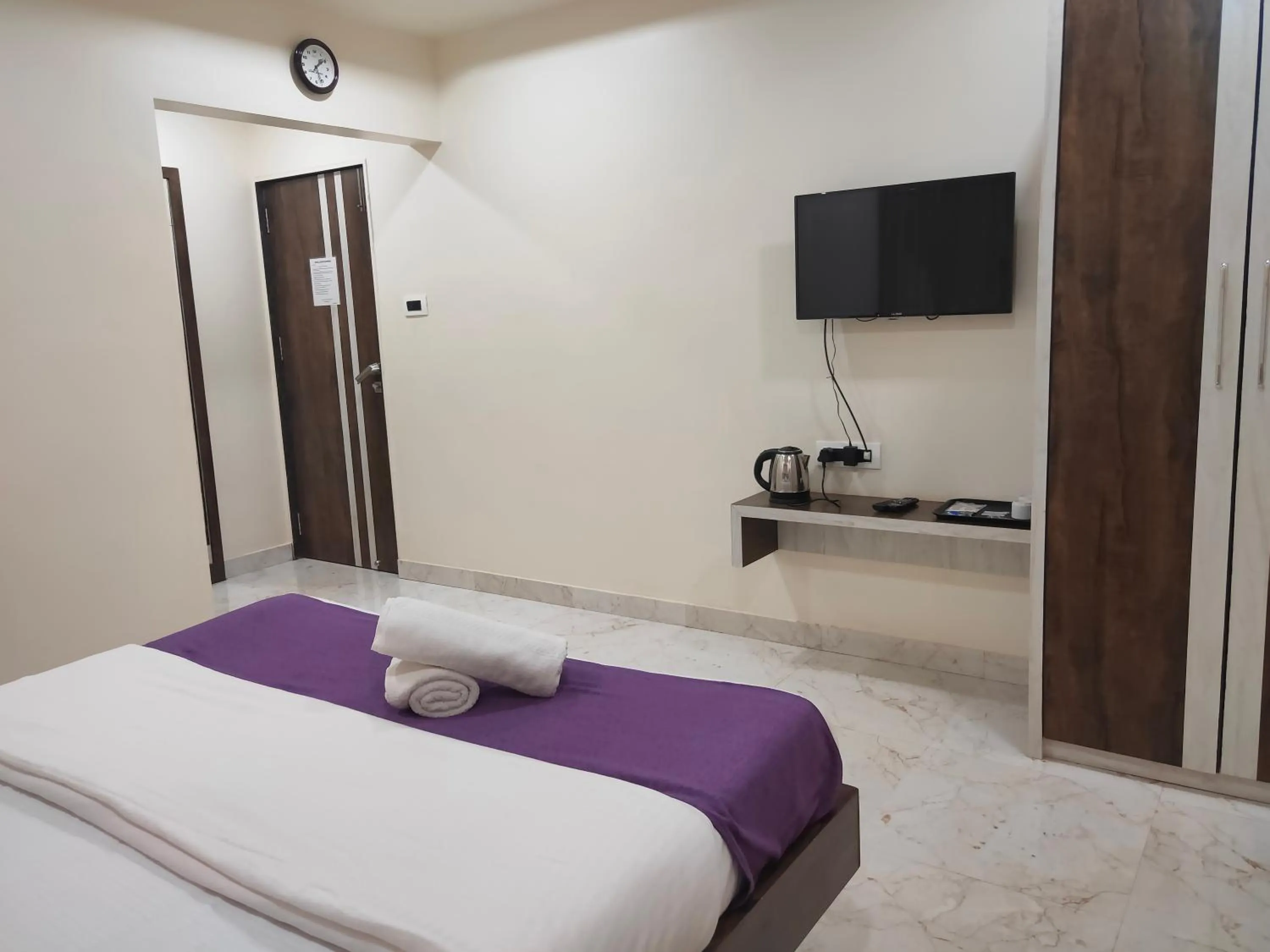 Bed in Hotel Grand Ganesha