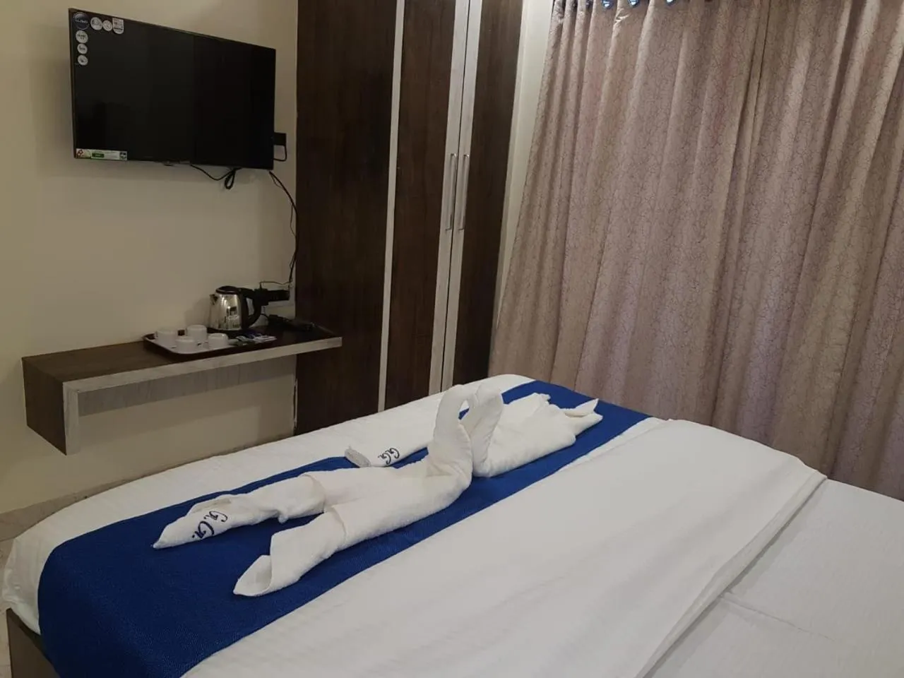 TV and multimedia, Bed in Hotel Grand Ganesha