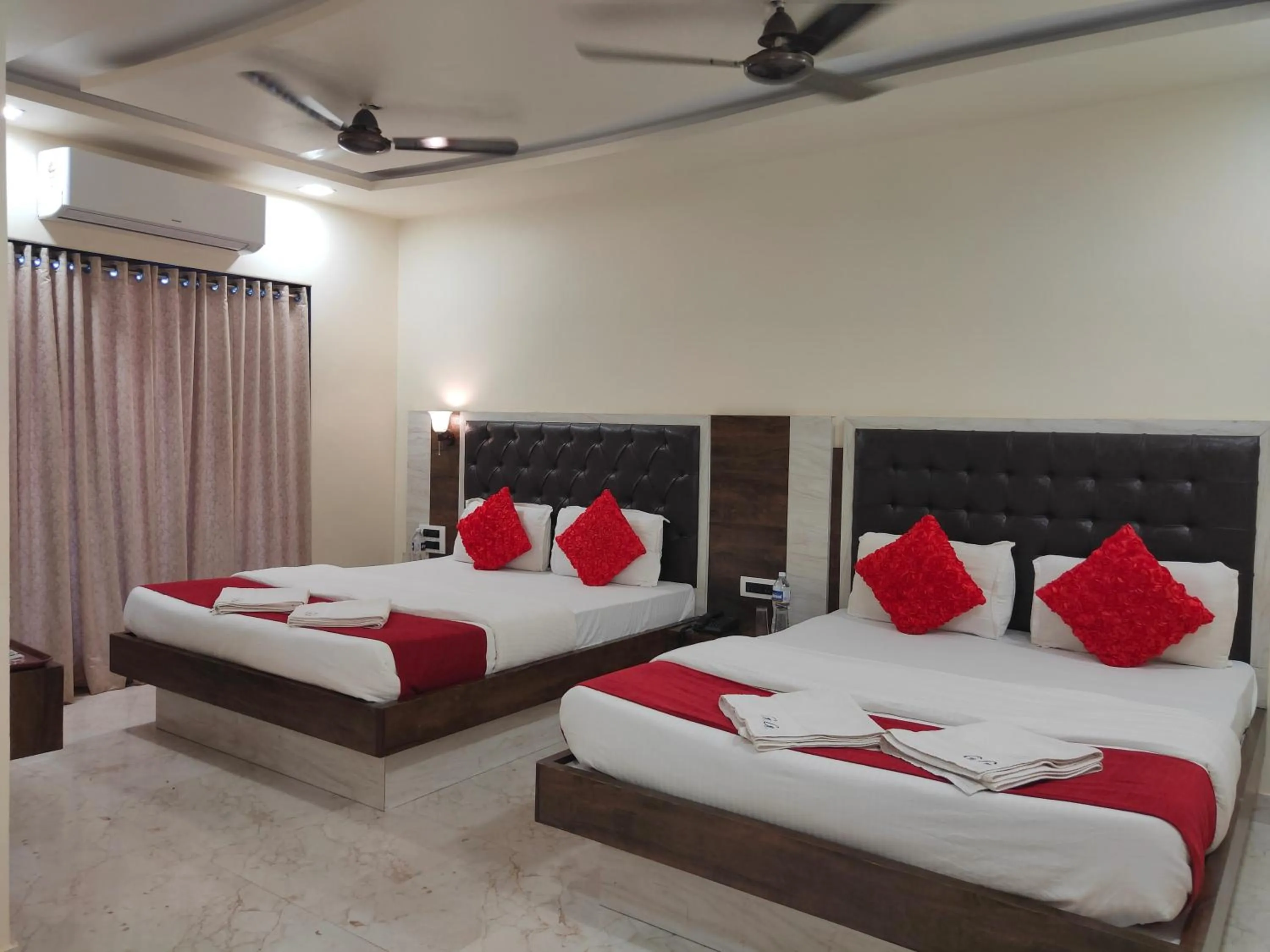 Bed in Hotel Grand Ganesha