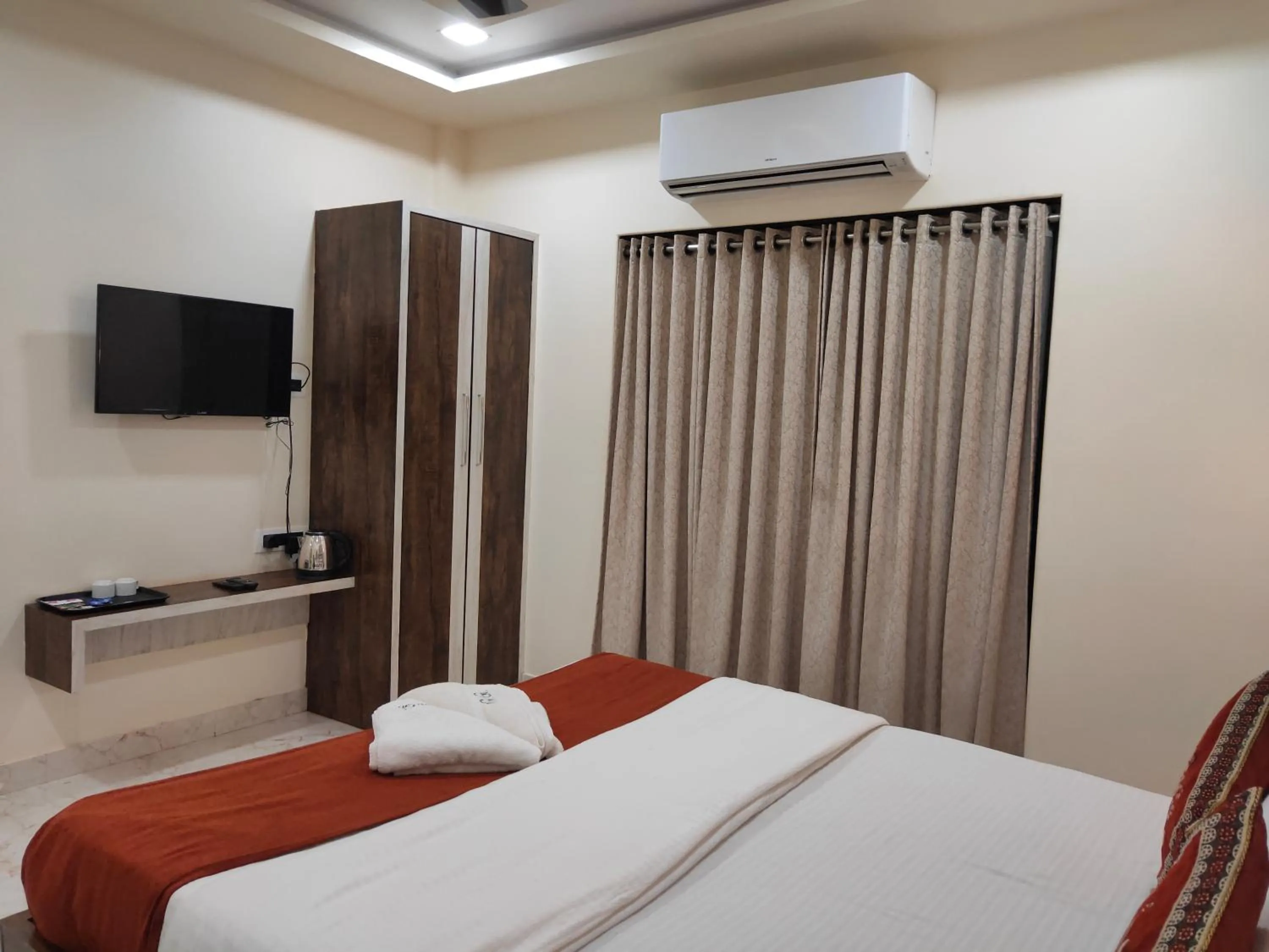 Bed in Hotel Grand Ganesha