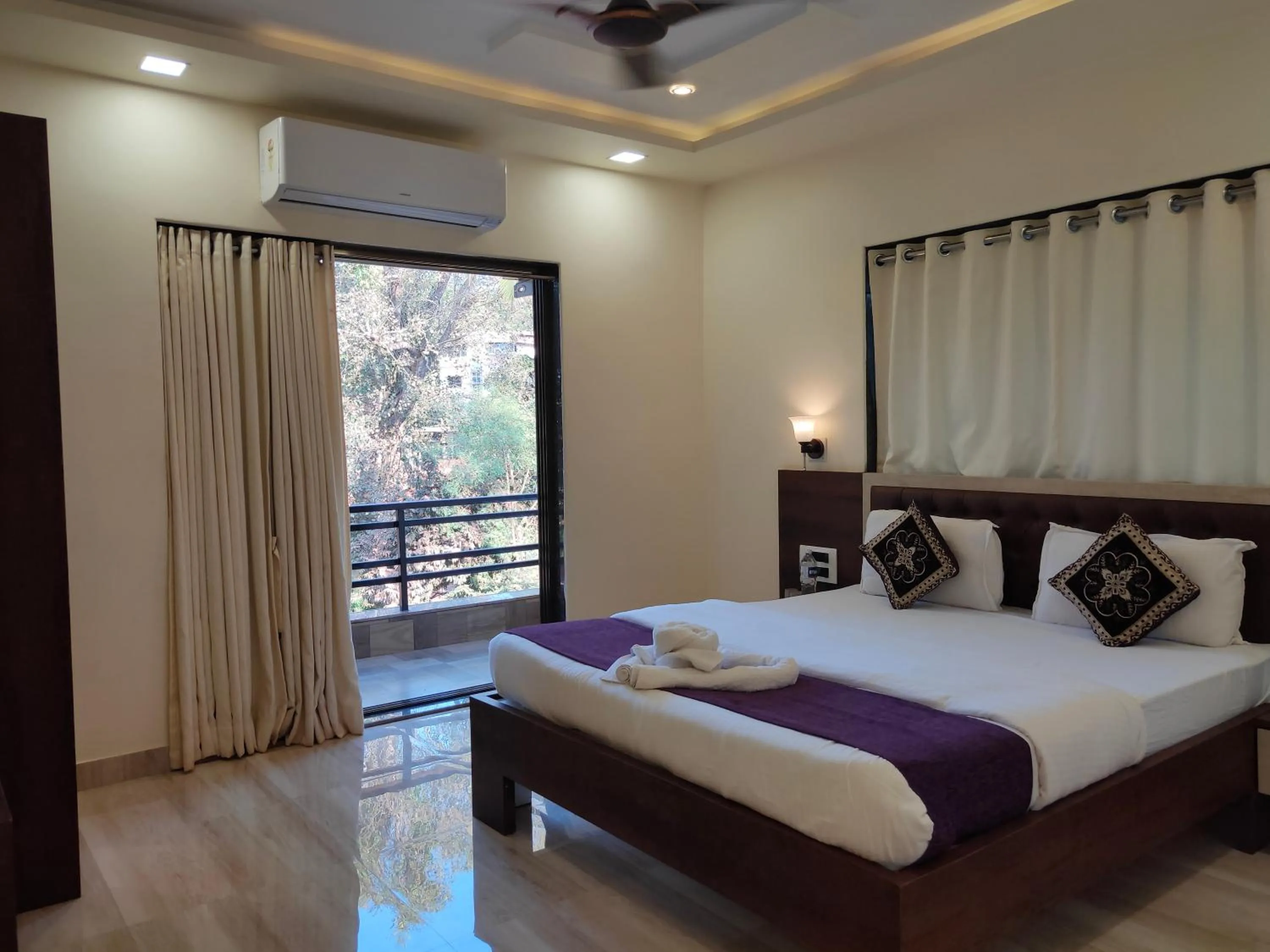 Bed in Hotel Grand Ganesha