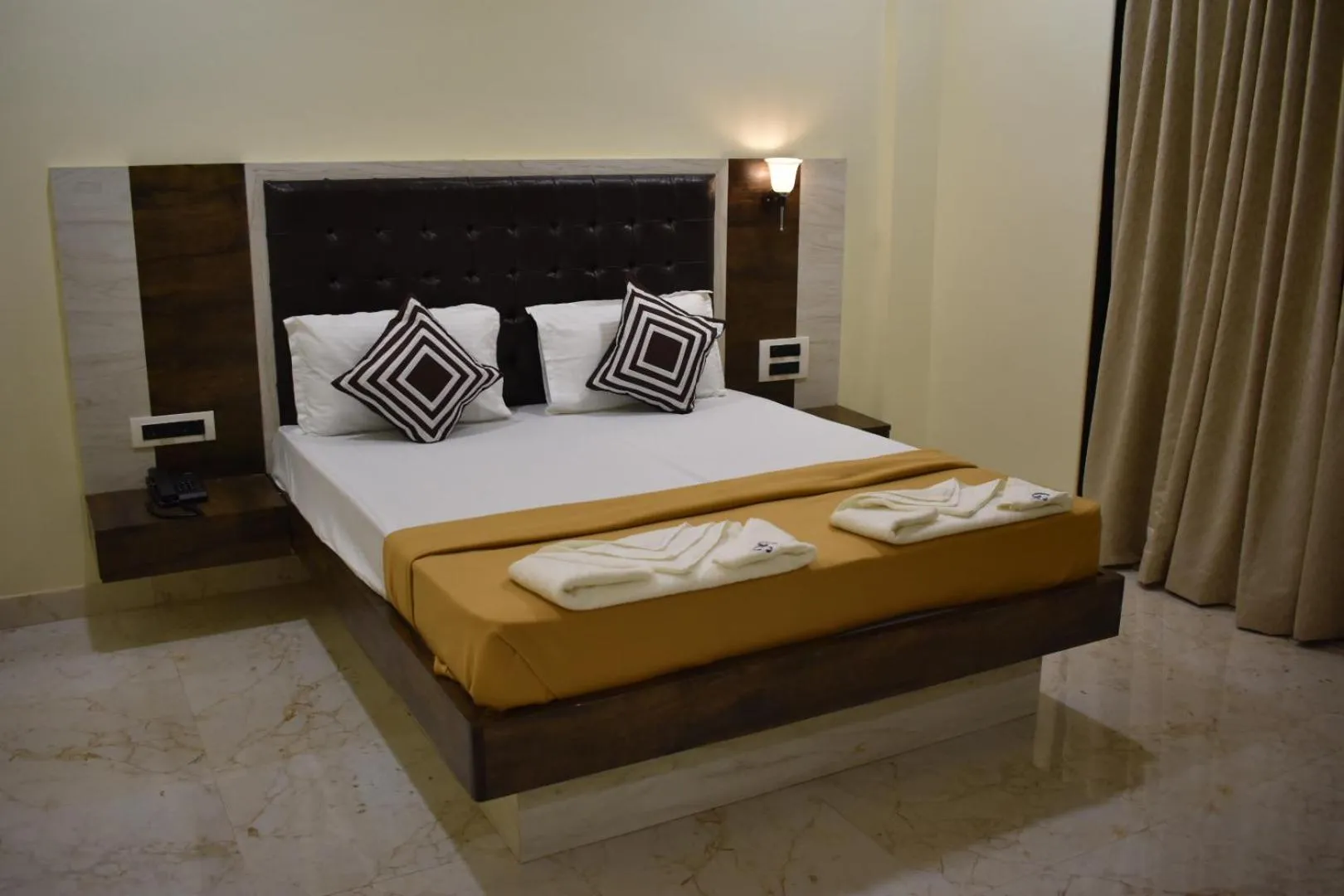 Bed in Hotel Grand Ganesha