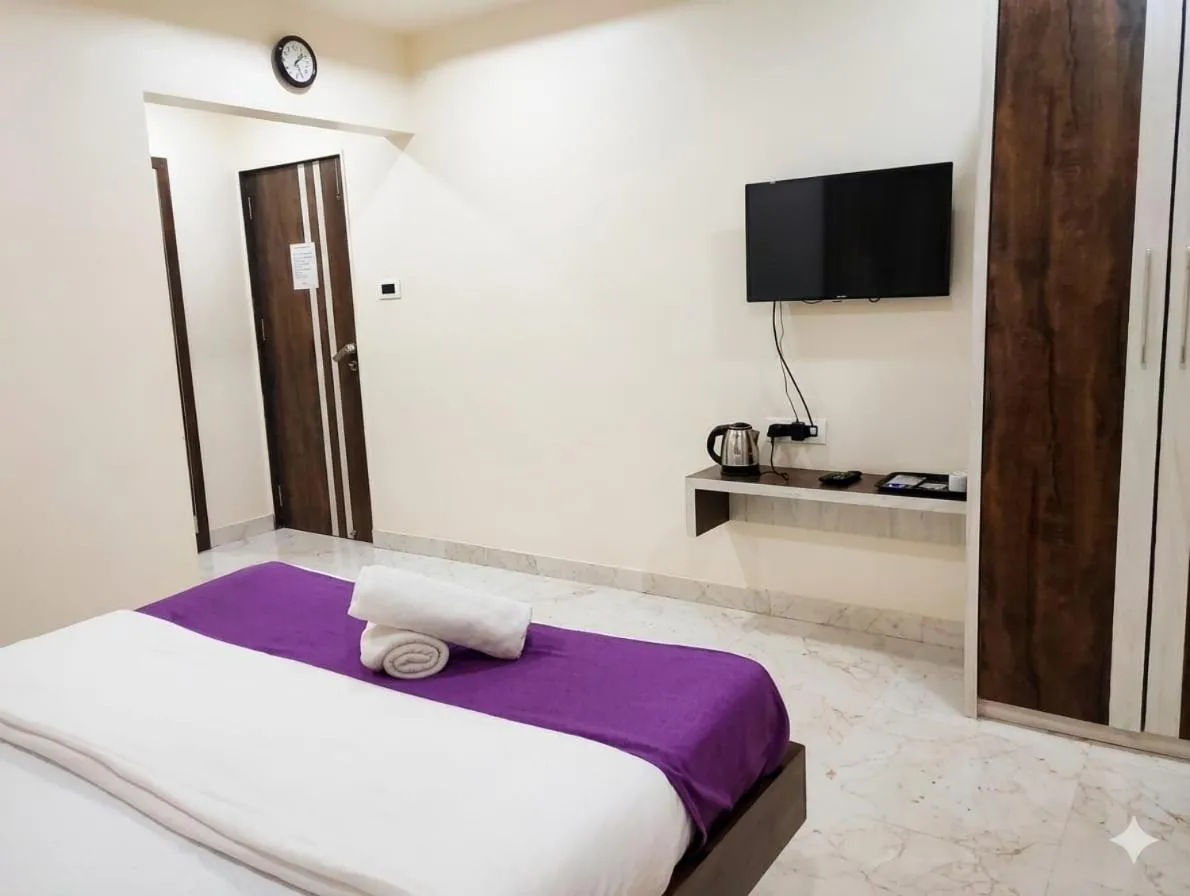 Bed in Hotel Grand Ganesha