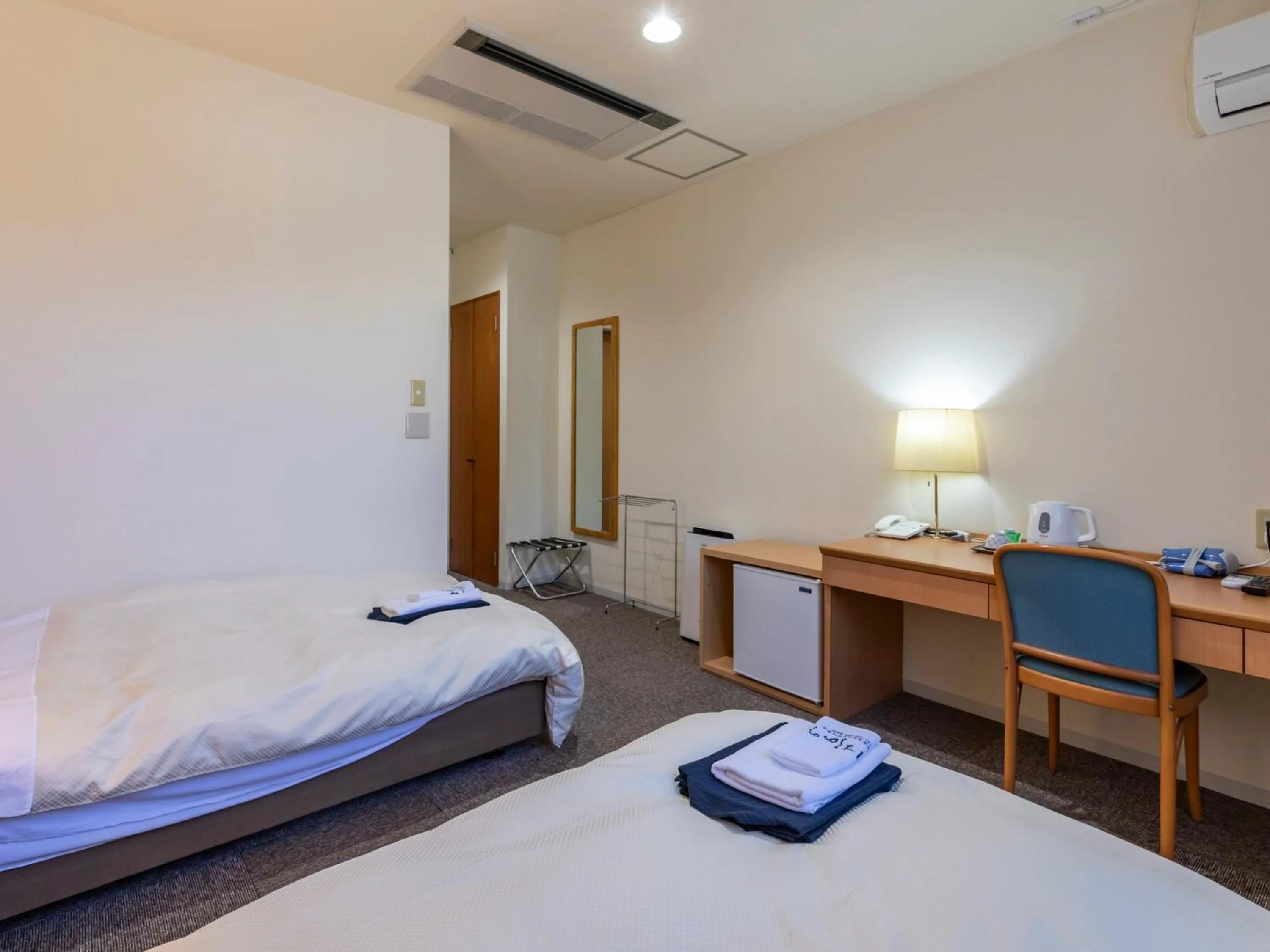 Photo of the whole room, Bed in Tennenonsen Harunonoyu