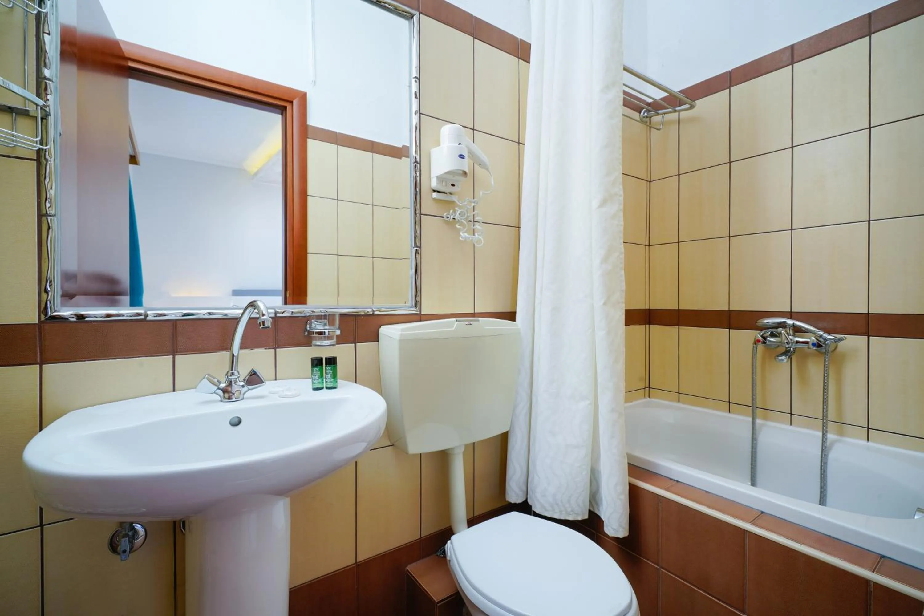 Toilet in Kamelia & Semeli Hotel