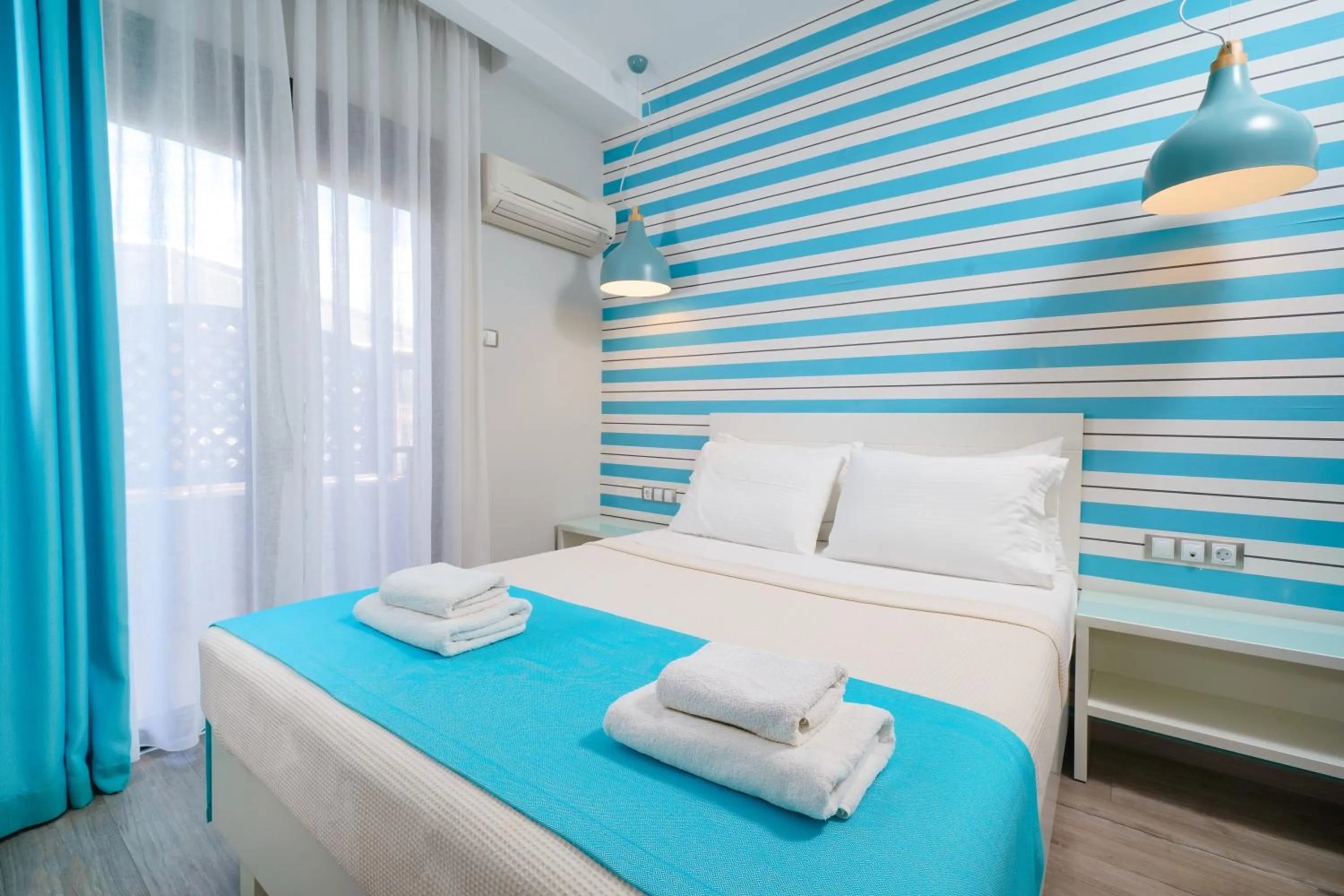 Bedroom in Kamelia & Semeli Hotel