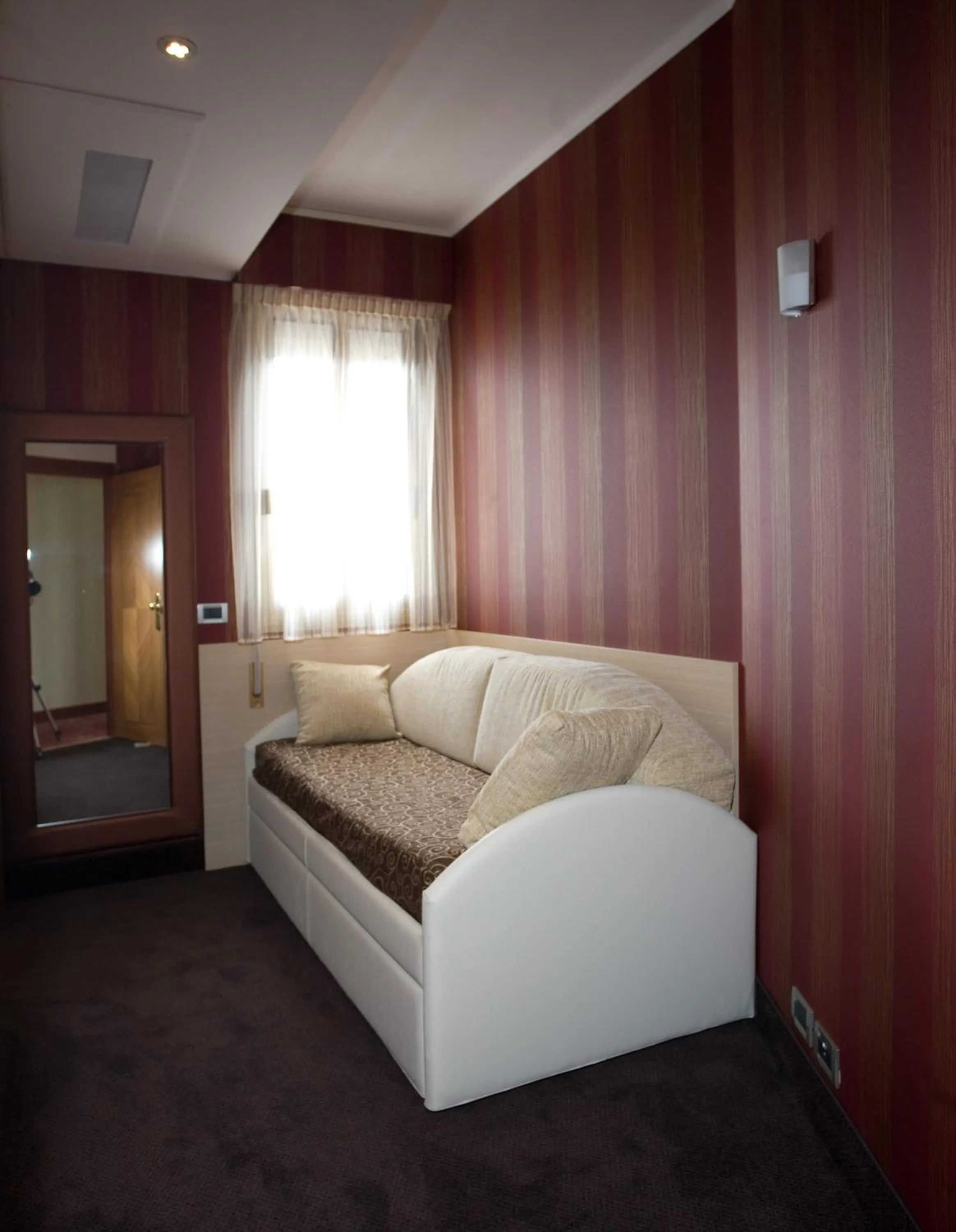 Seating area, Bed in Hotel Rivamare