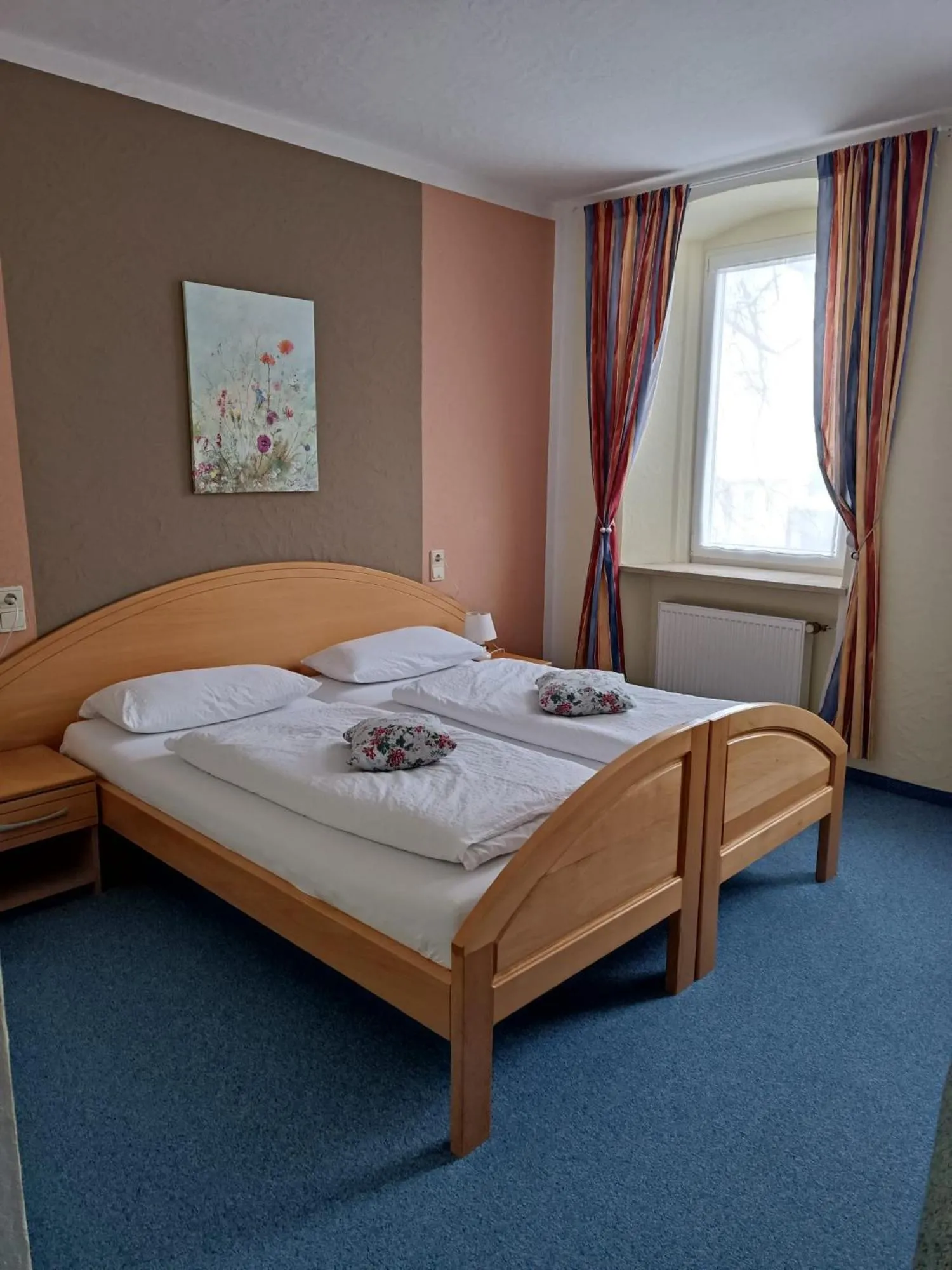 Bed in Garni Hotel Post