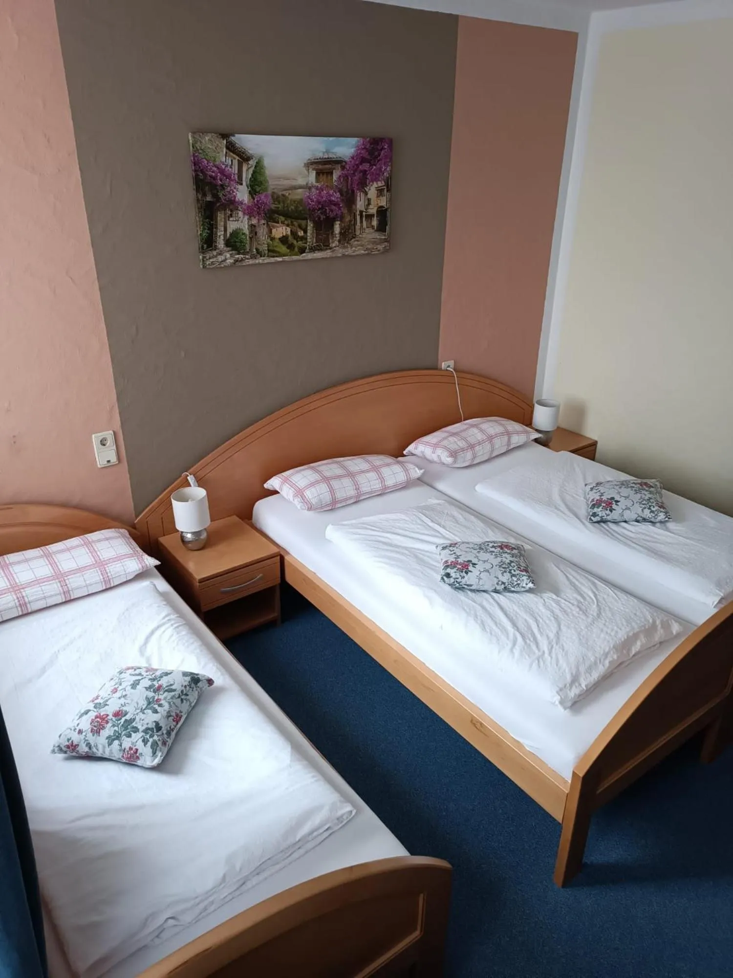 Bed in Garni Hotel Post