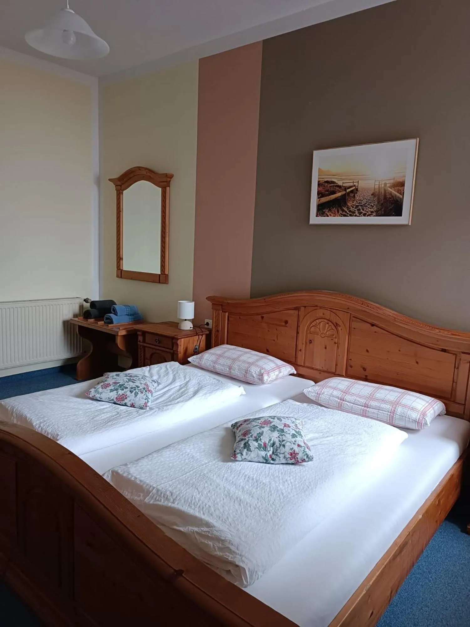 Bed in Garni Hotel Post