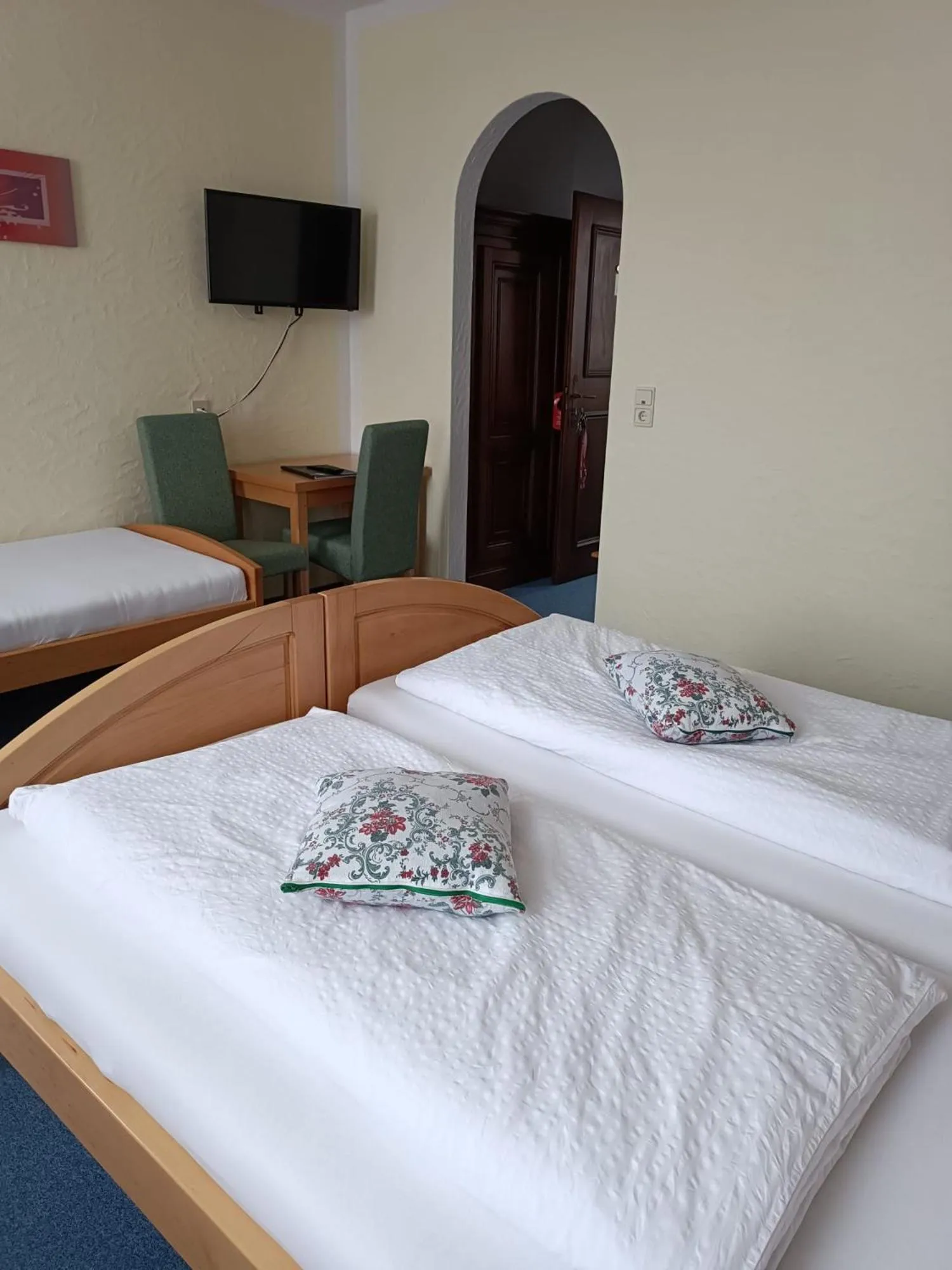 Bed in Garni Hotel Post