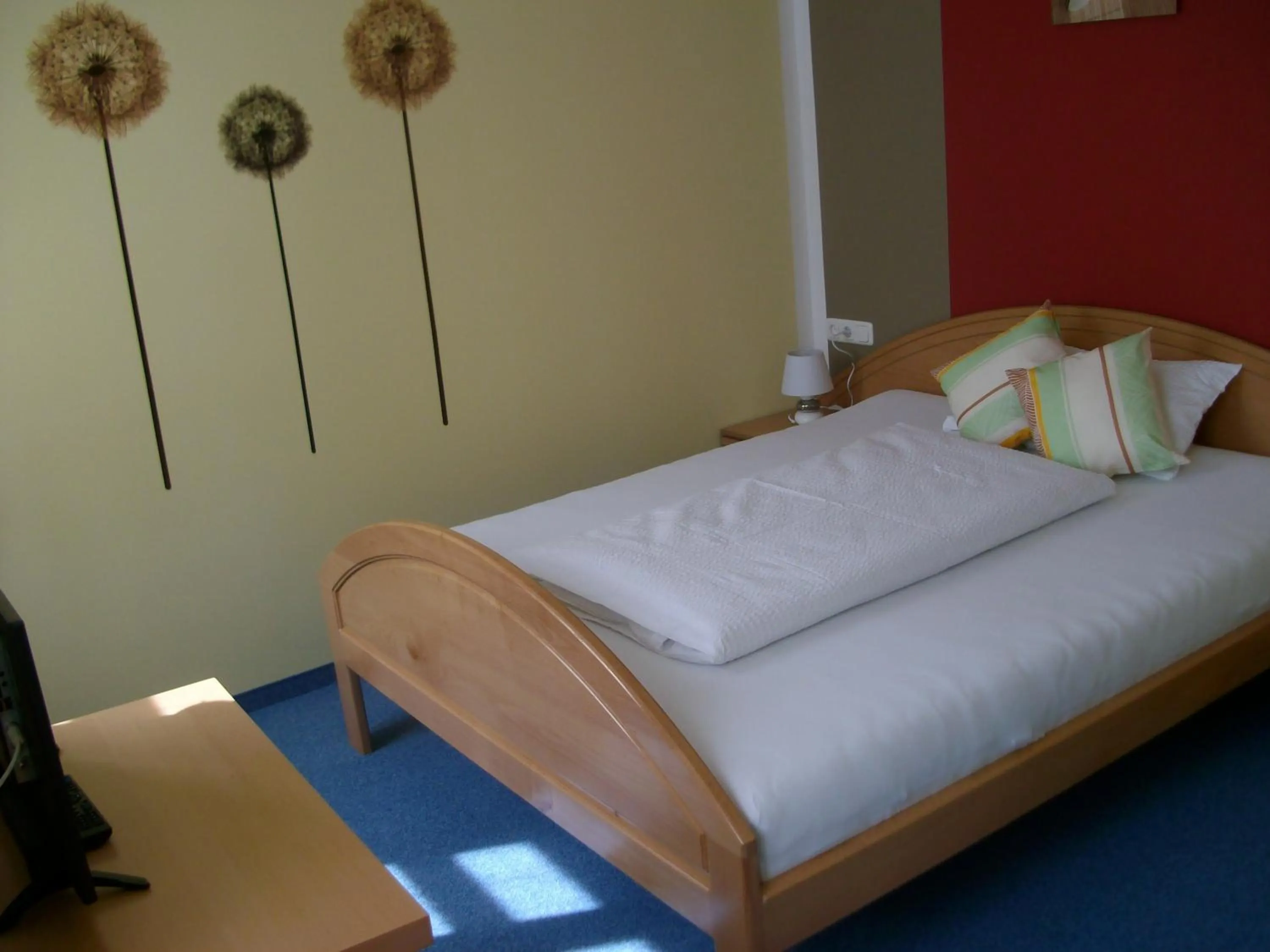 Bed in Garni Hotel Post