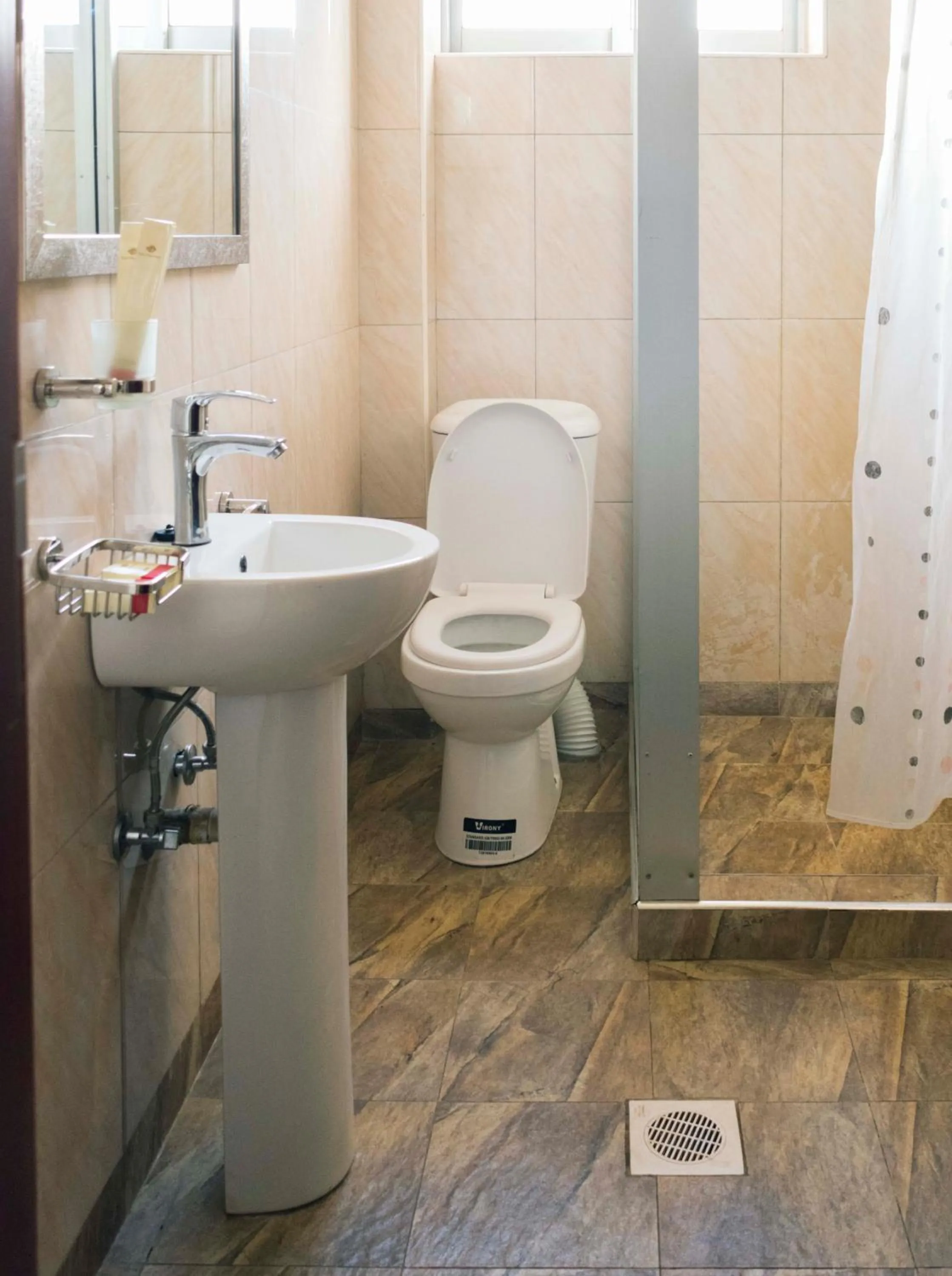 Toilet in Easy View Hotel Mbarara