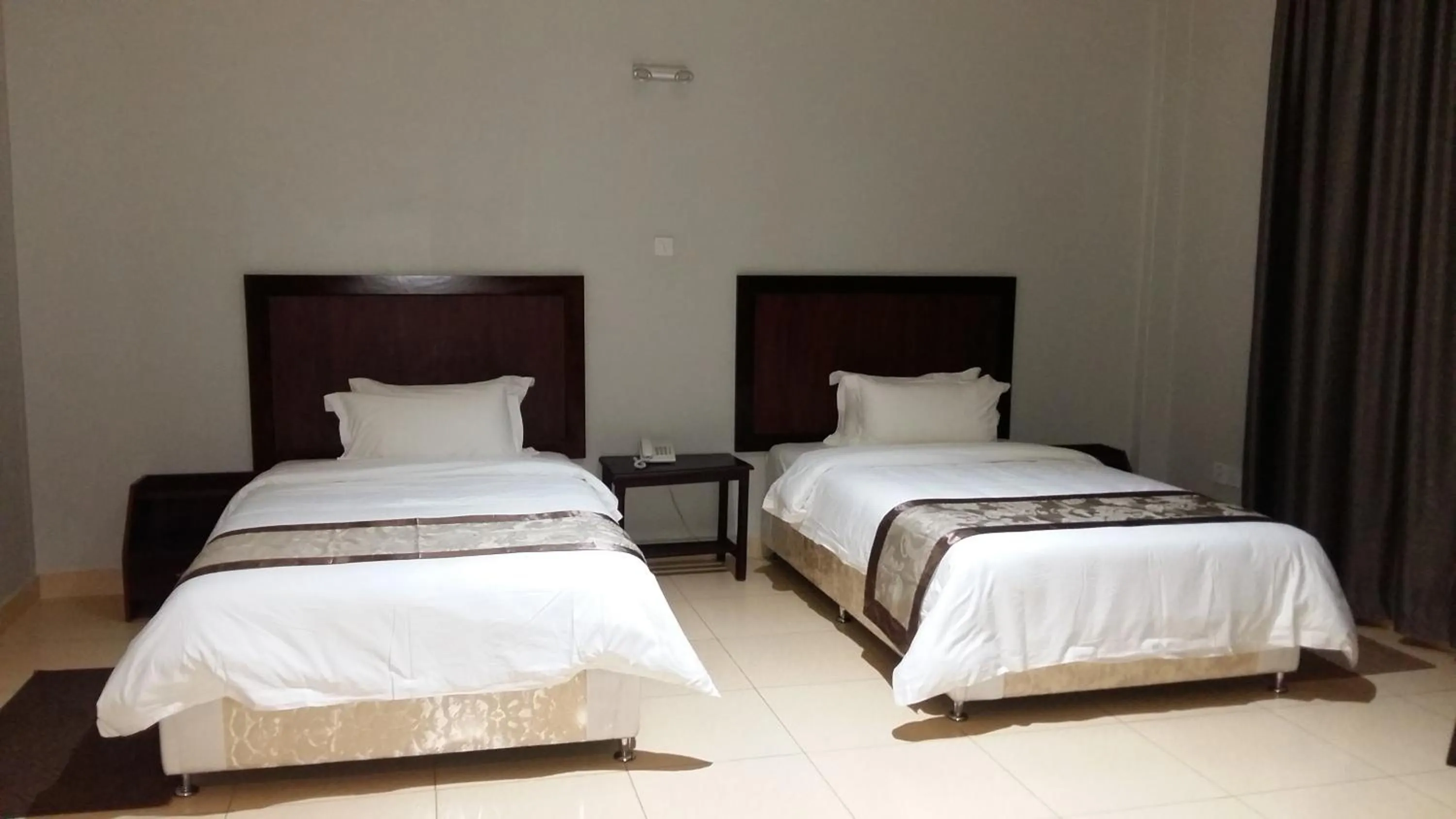 Bed in Easy View Hotel Mbarara